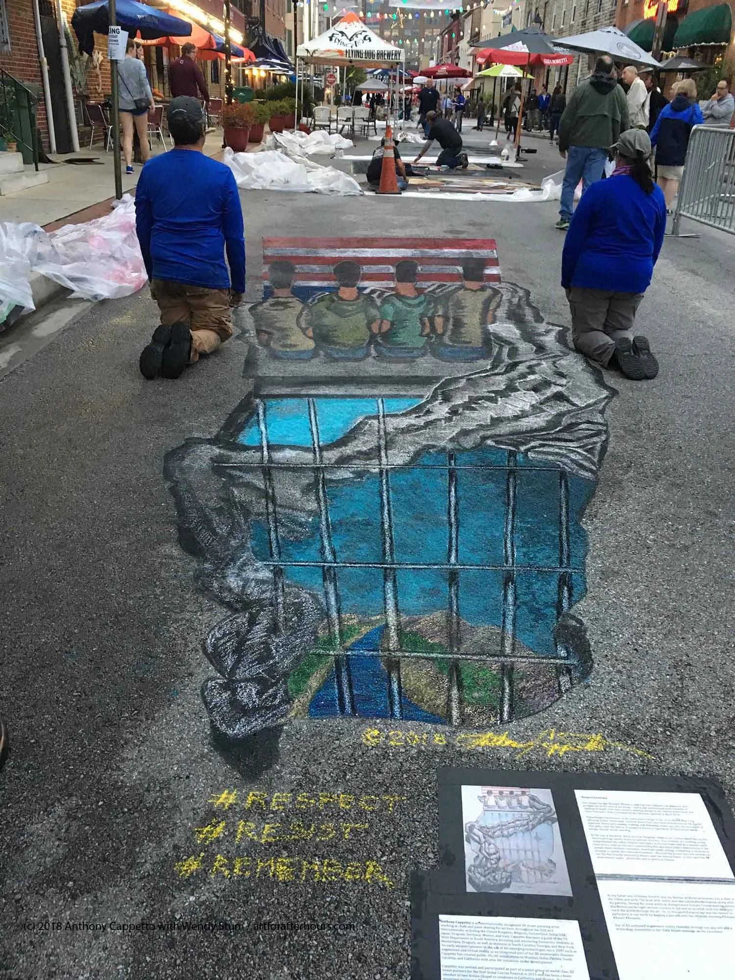 Artists Anthony Cappetto and Wendy Stum facing with the drawn children in solidarity.