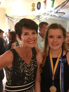 The author and her daughter, Josie, at 8th grade graduation. 