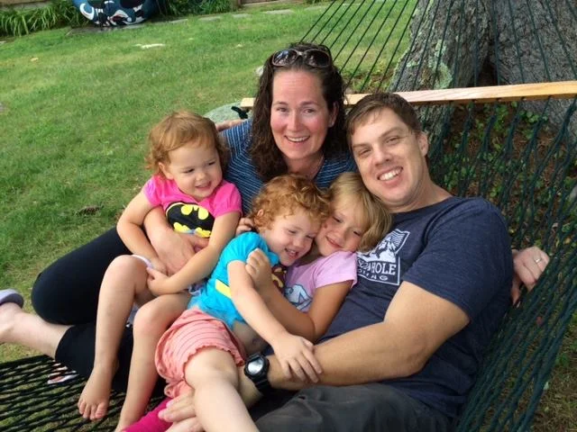 The author, her partner, and their three daughters. 