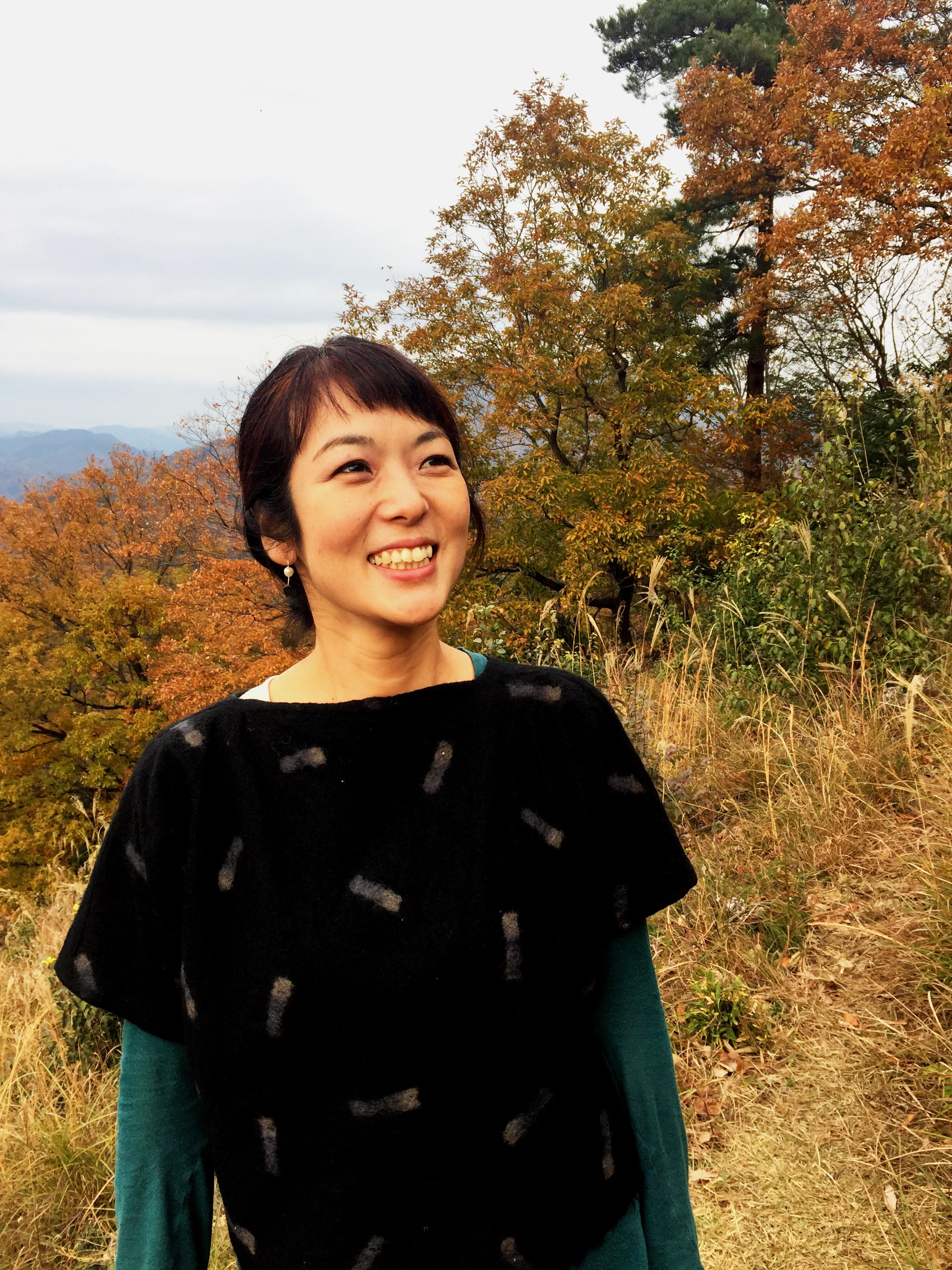 Aki Kato. Below, Miituk custom picnic spreads and Aki at work. 