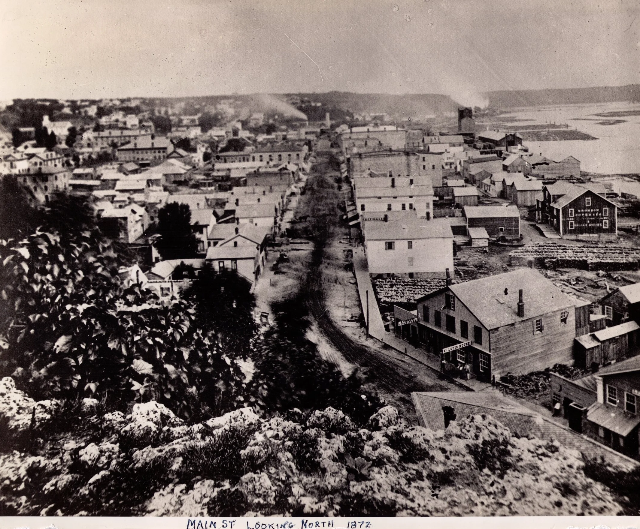 View north from the top of the South Main Street Stairs in 1872. This photo is from the John Runk Collection, courtesy of the Stillwater Public Library. This was a period of high activity for the lumber industry in Stillwater.