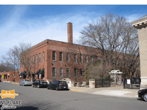 This is a view to the Northeast of the Connolly Shoe Company. Second Street appears to be a dirt surface and the garden is not yet in place. The time tunnel takes you from 2017 to about the 1910 time period. The historic photo is from the John Runk Collection courtesy of the Stillwater Public Library.
