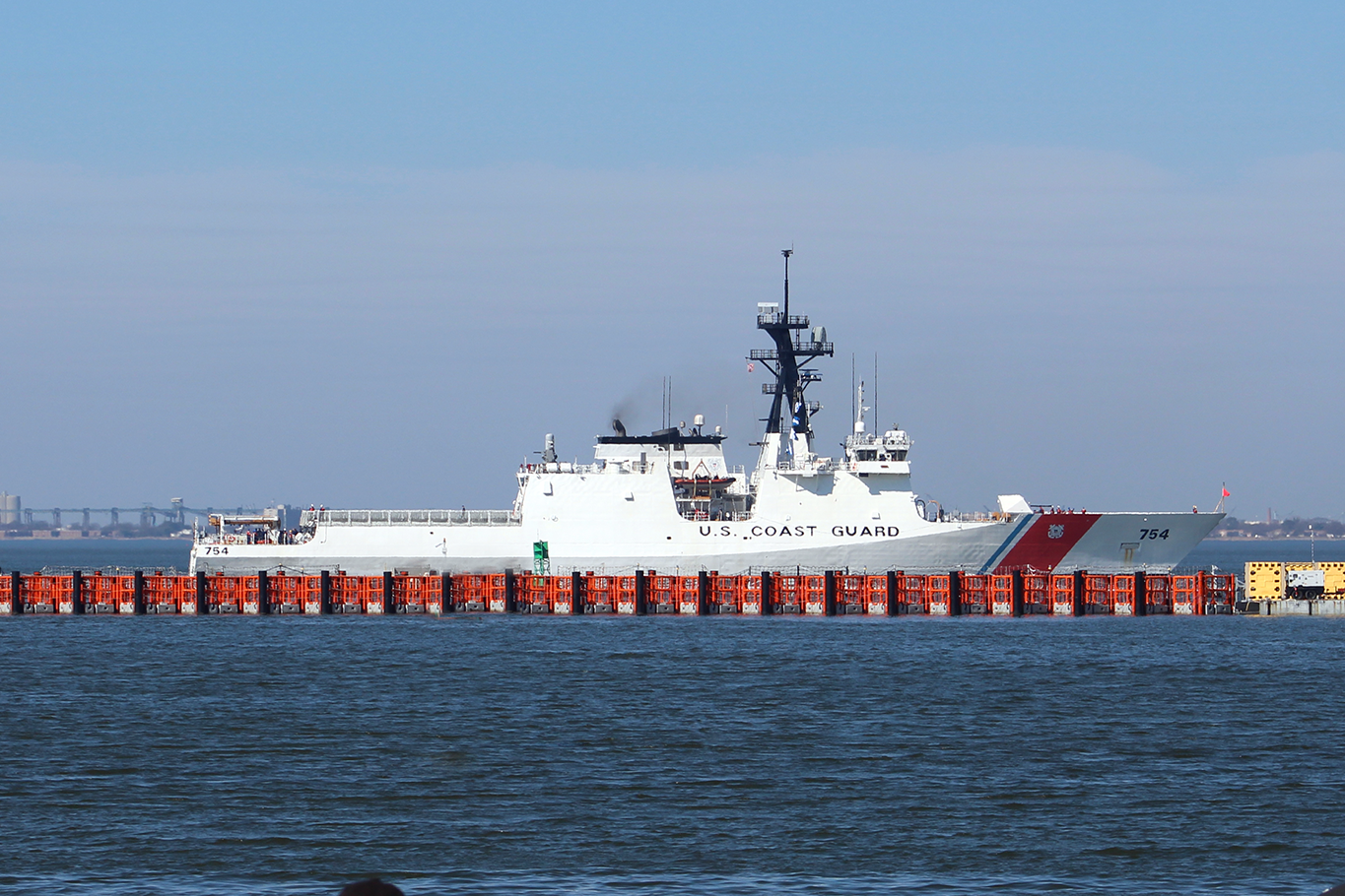 GUARDIAN® with FORTRESS™ automatic gate controller in front of a US Coast Guard ship.