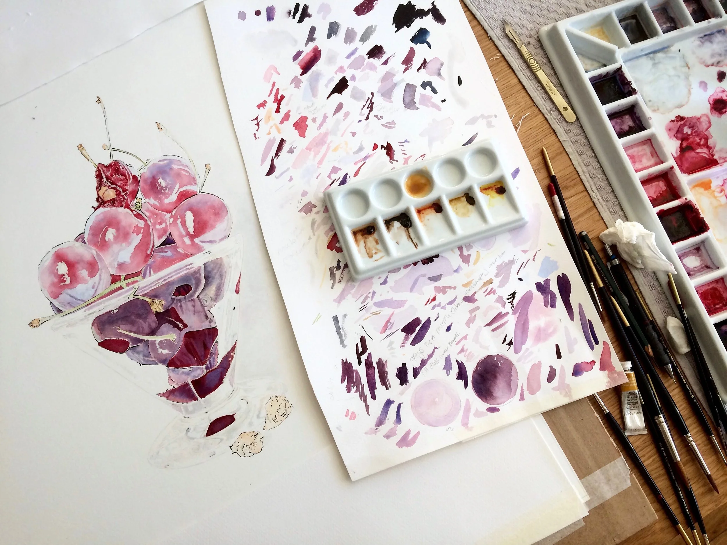 Watercolour painting of cherries in progress by Lucy Clayton