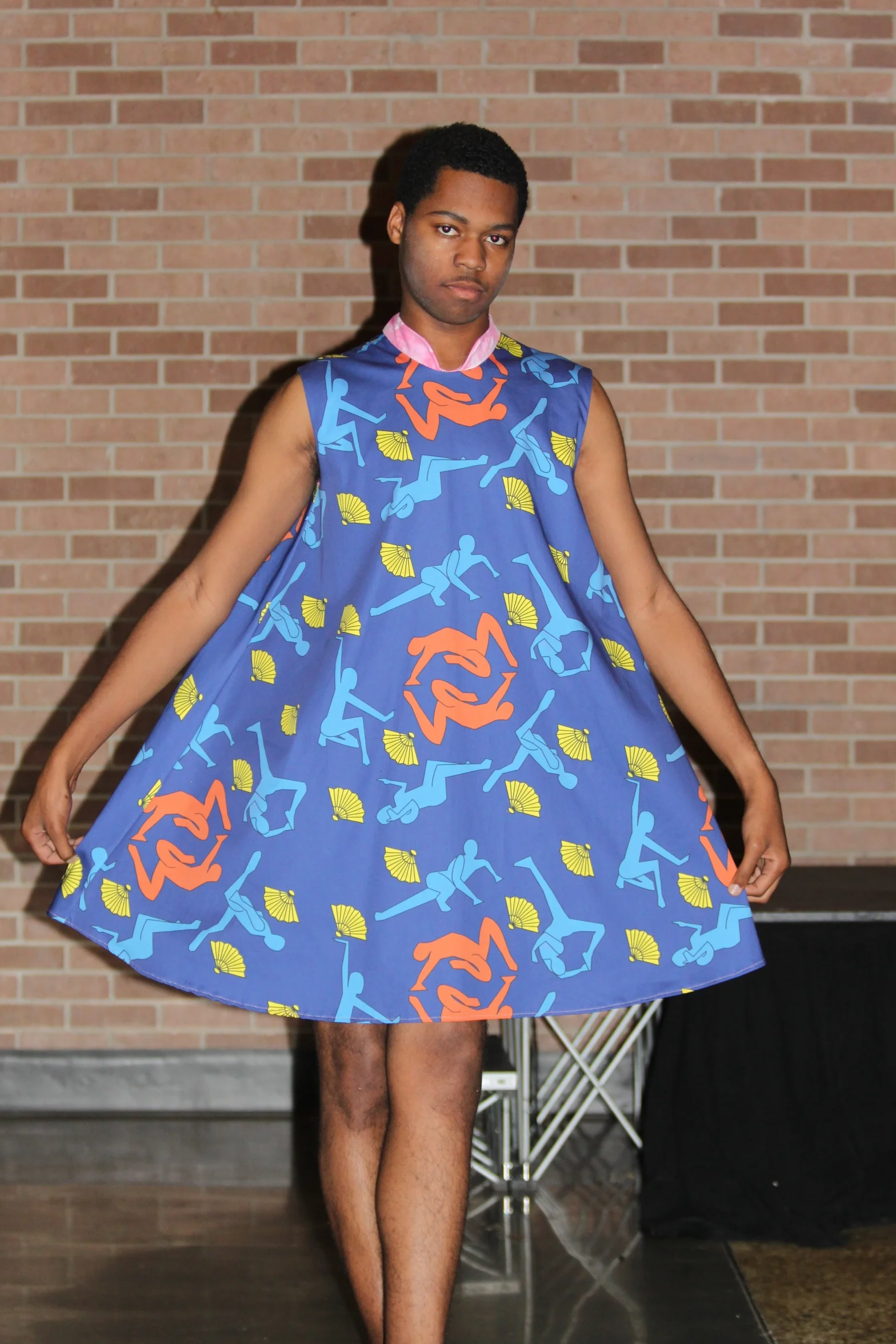  To play with the idea of gender presentation, I decided to use a male model for the look. I wanted to visually showcase the fluidity of gender presentation by contrasting the feminine garment with a male figure as a fresh take on gender-nonconformin