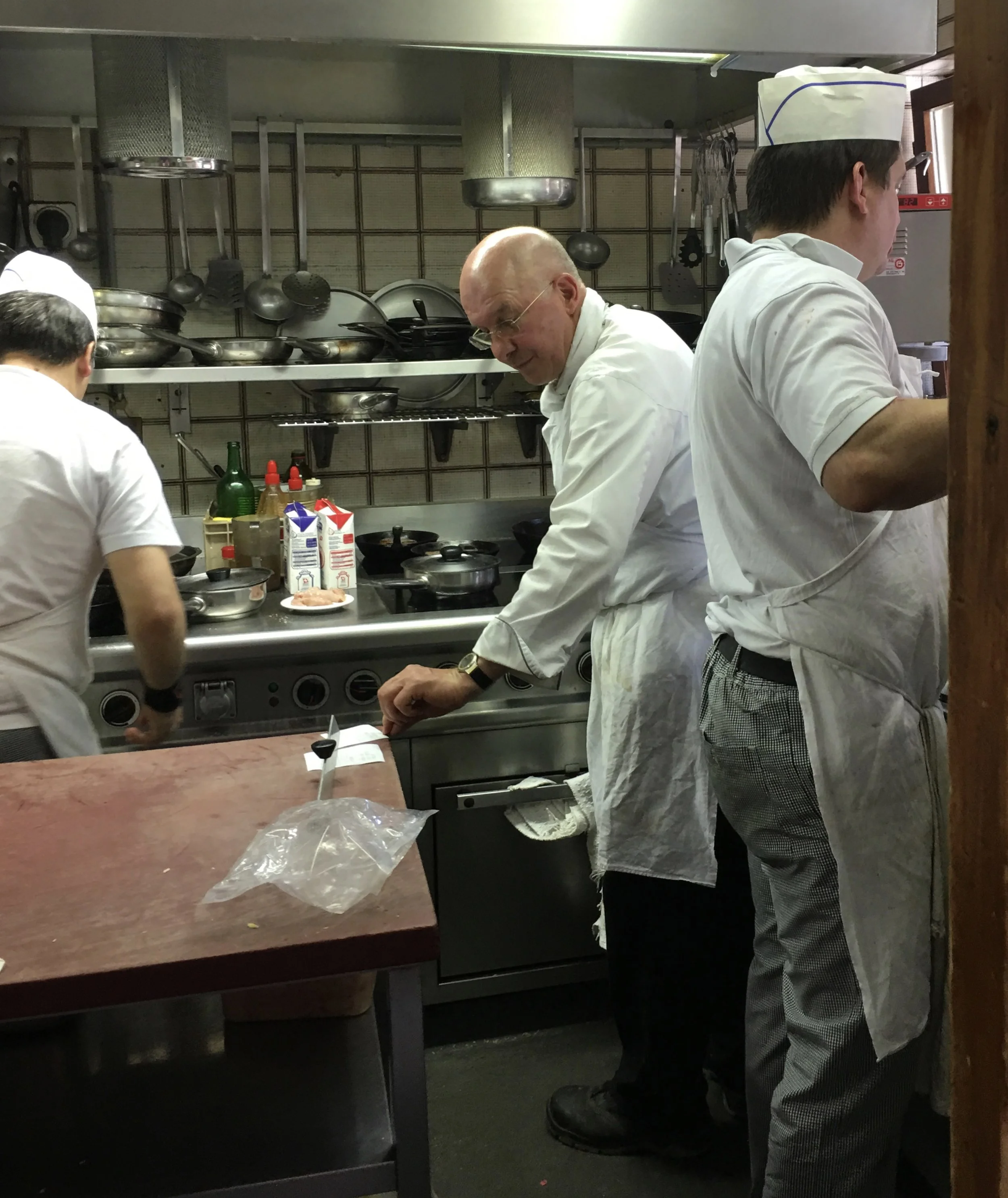 Max orchestrating in the kitchen of Zum See