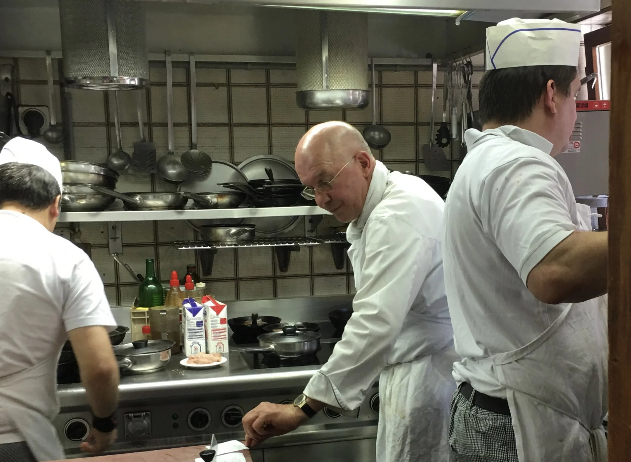 Max orchestrating in the kitchen