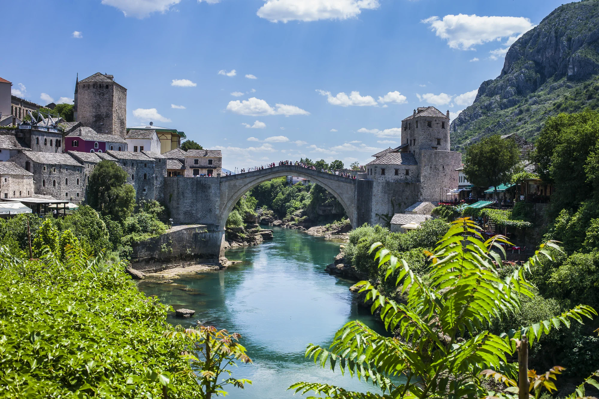 The Mostar Bridge was built in the 1500's by the Ottomans, destroyed in 1993 by the Croats, rebuilt in 2004, and is under Unesco protection since 2005