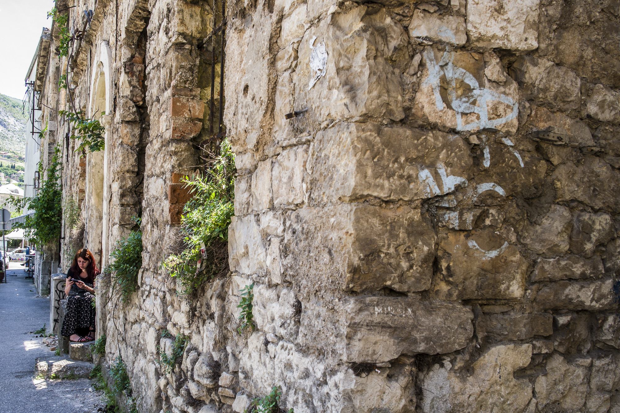 Woman in a Ruined building