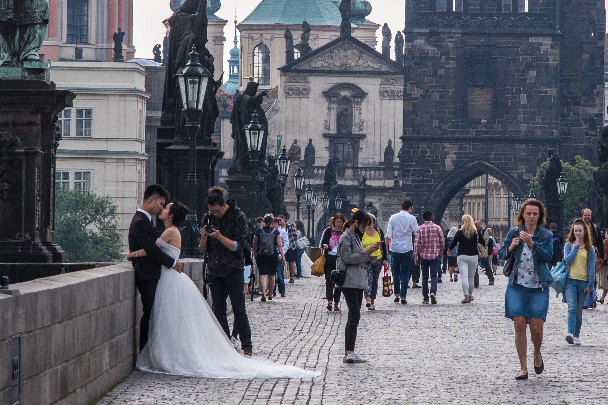 Wedding photos on the Charles Bridge is a common sight in the morning light