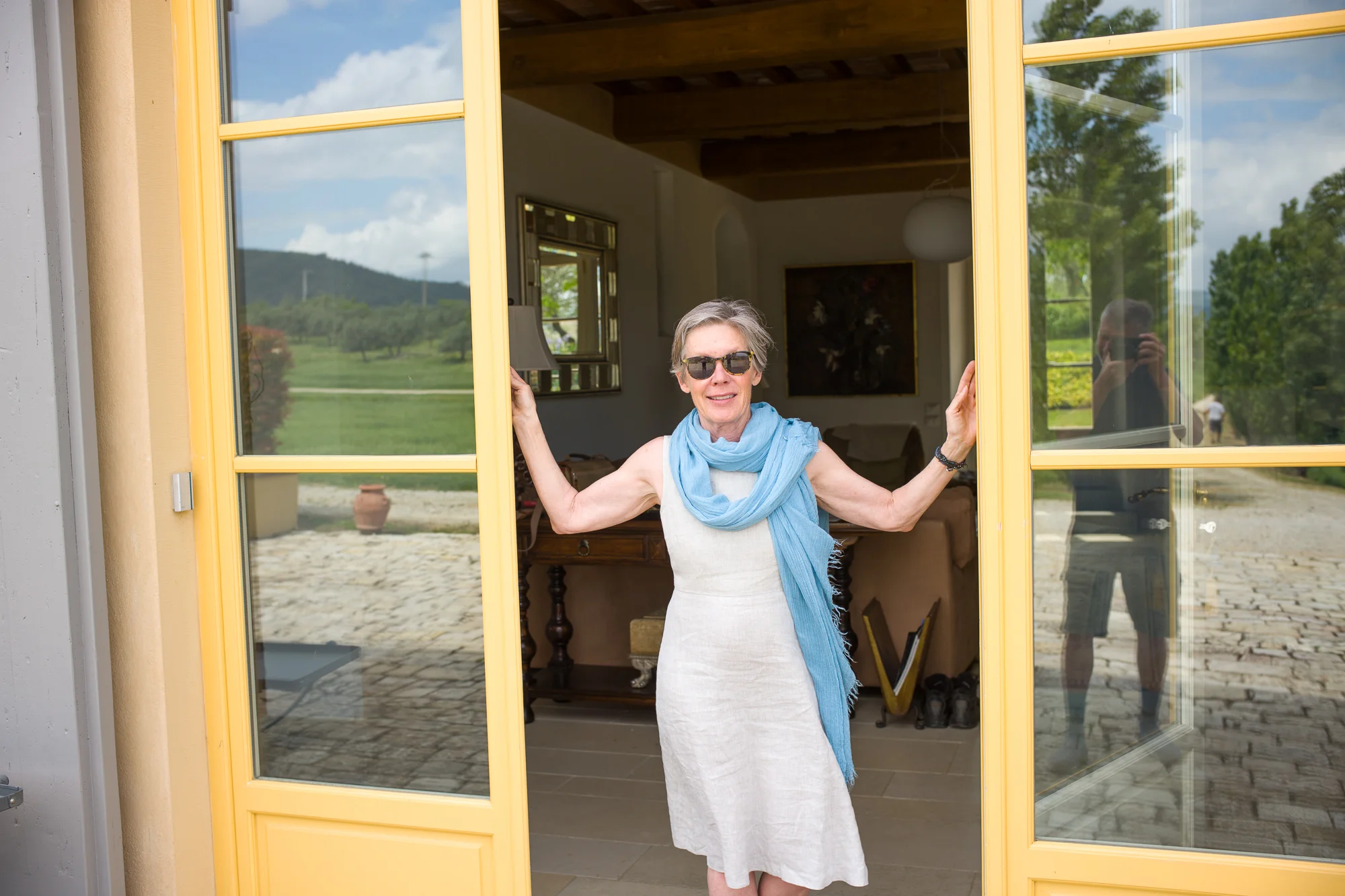 Cheryl greeting the Gang of Eight at Villa Oliveto