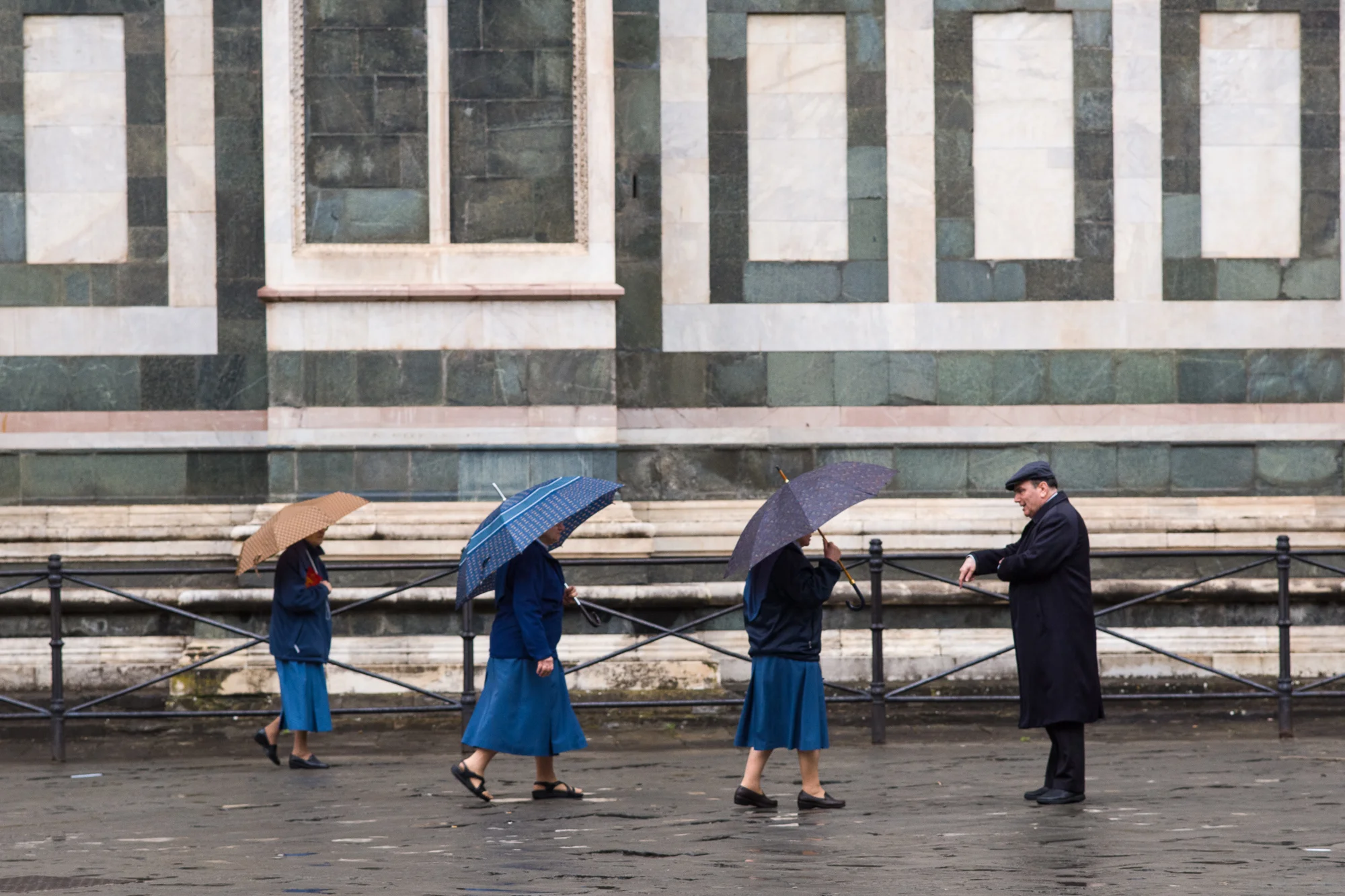 Nuns walking to morning prayers outside the Duomo