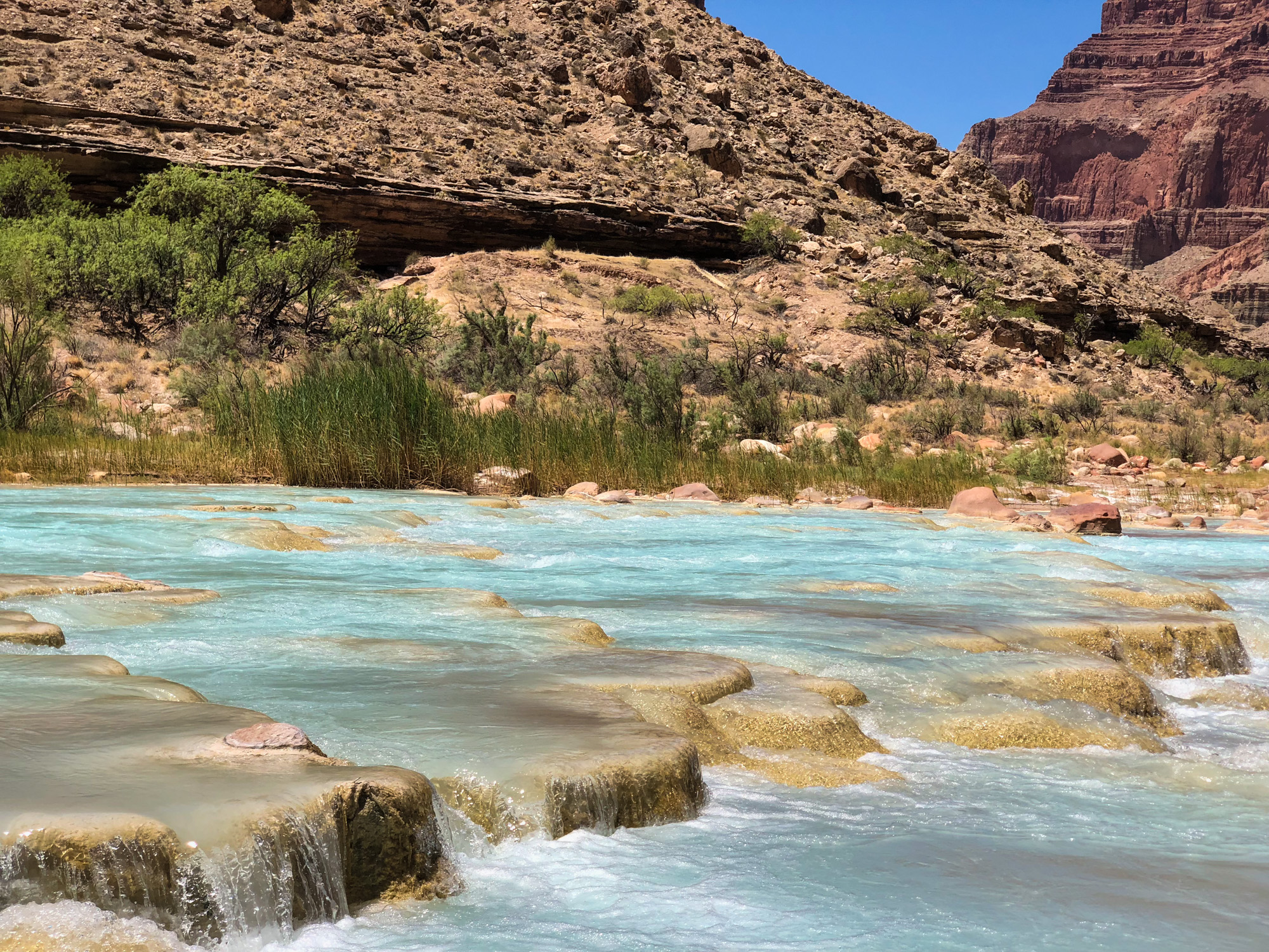  Travertine ledges and turquoise blue of the Little Colorado River 