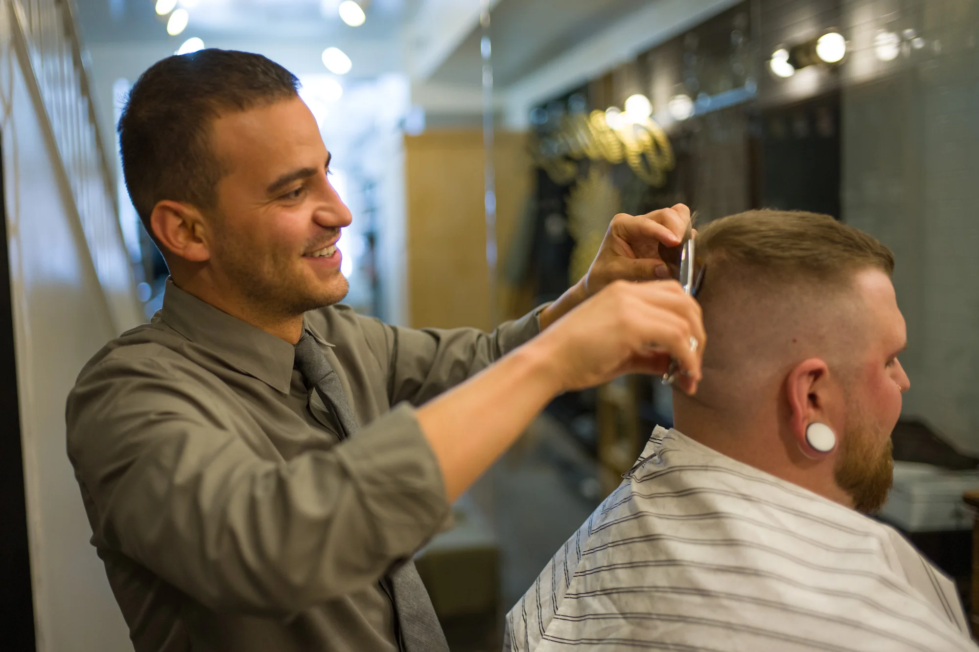 Jorge at work in Billy’s Barber Shop