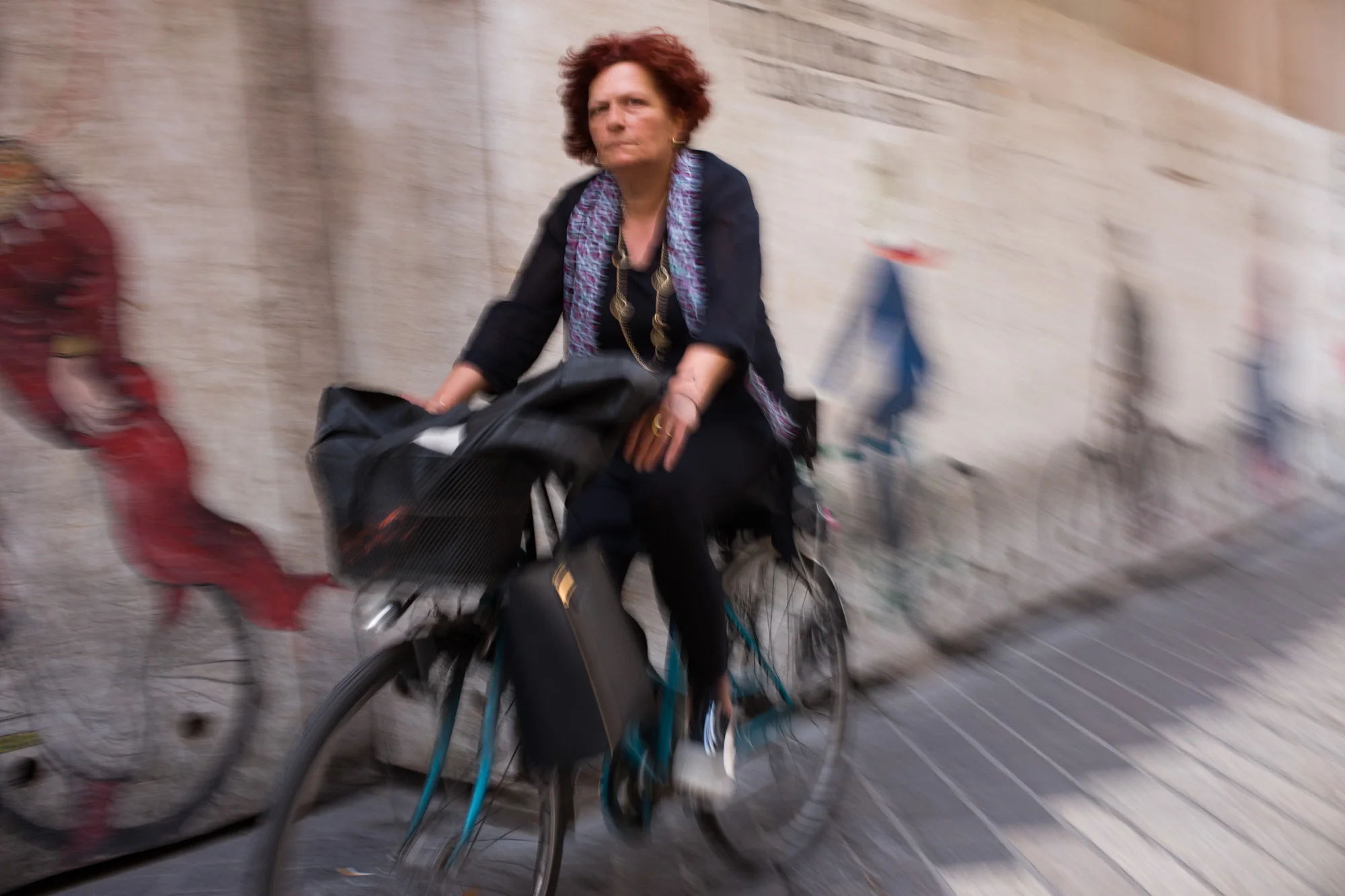 A local riding past bicycle street art