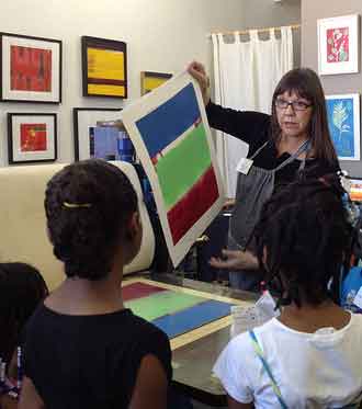 Shipyard artist Marc Ellen Hamel teaching printmaking