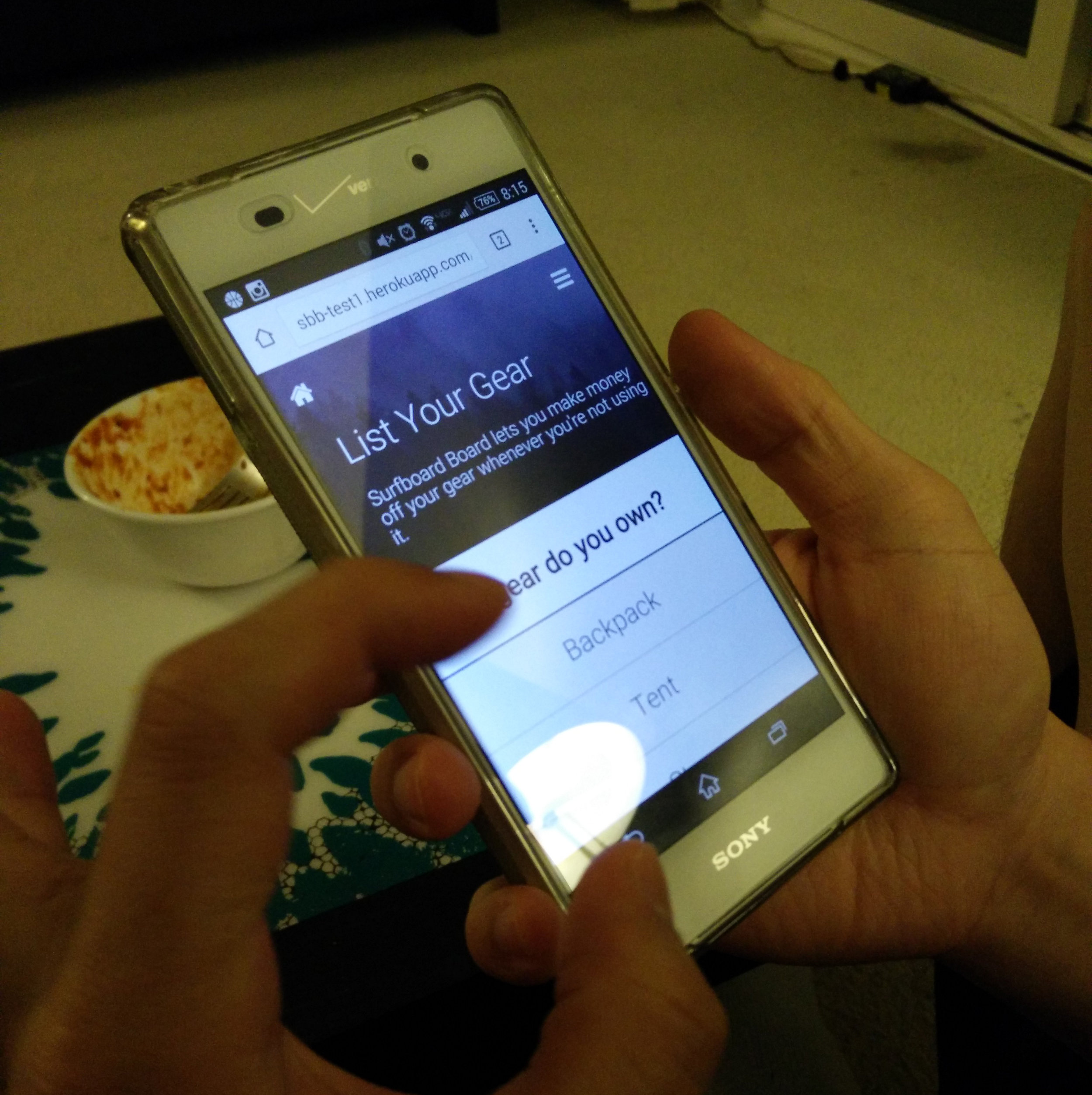 User testing out our mobile prototype.