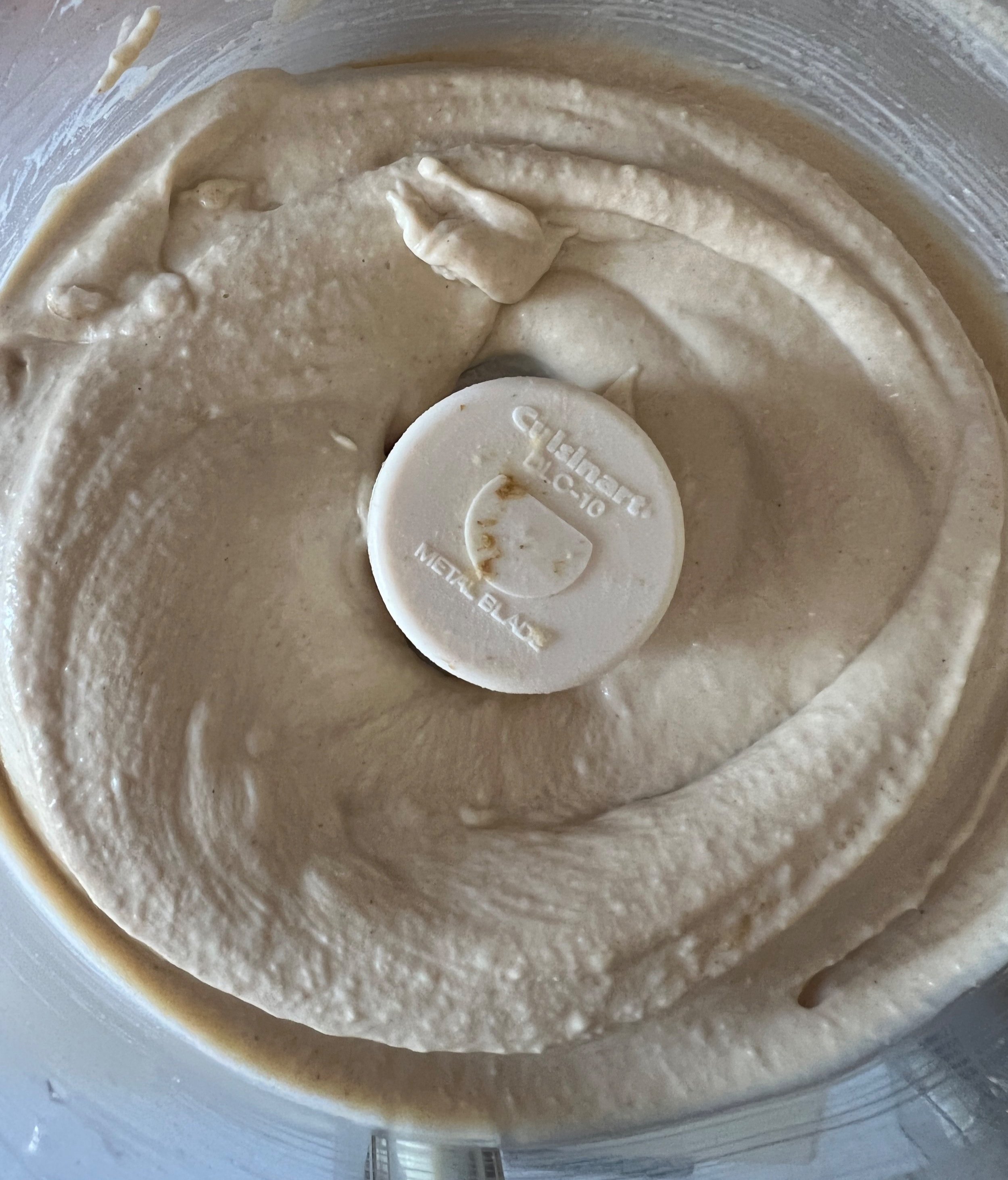 Hummus after blending in the chickpeas. 