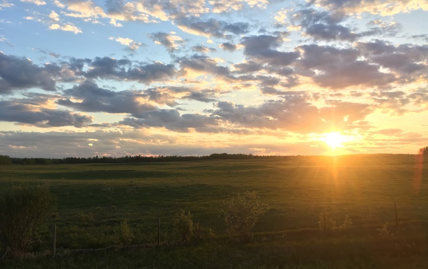  Sun setting west of Pigeon Lake. 