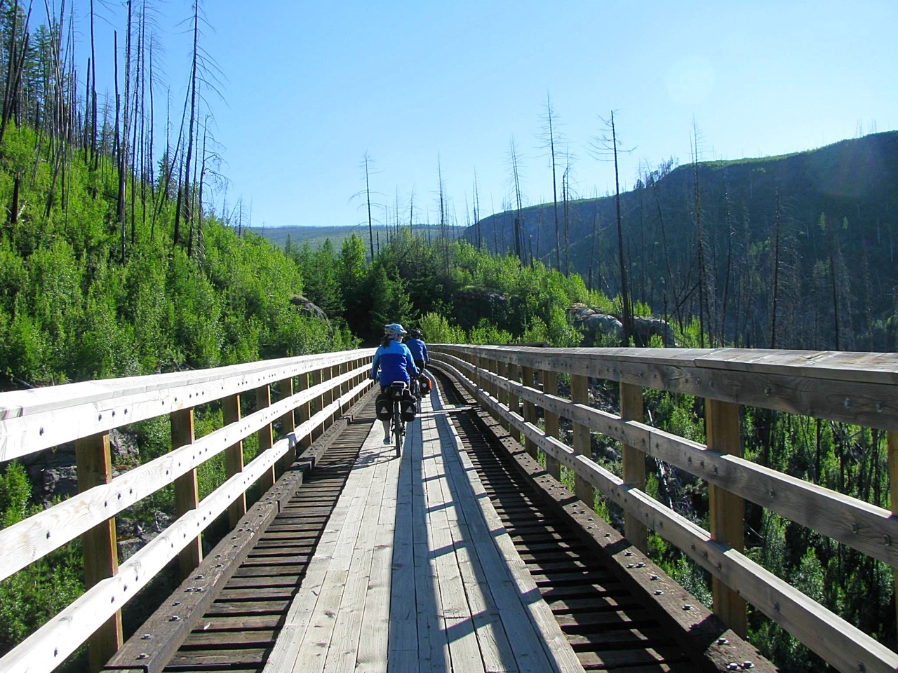 Biking across one of the trestles at Myra Canyon.