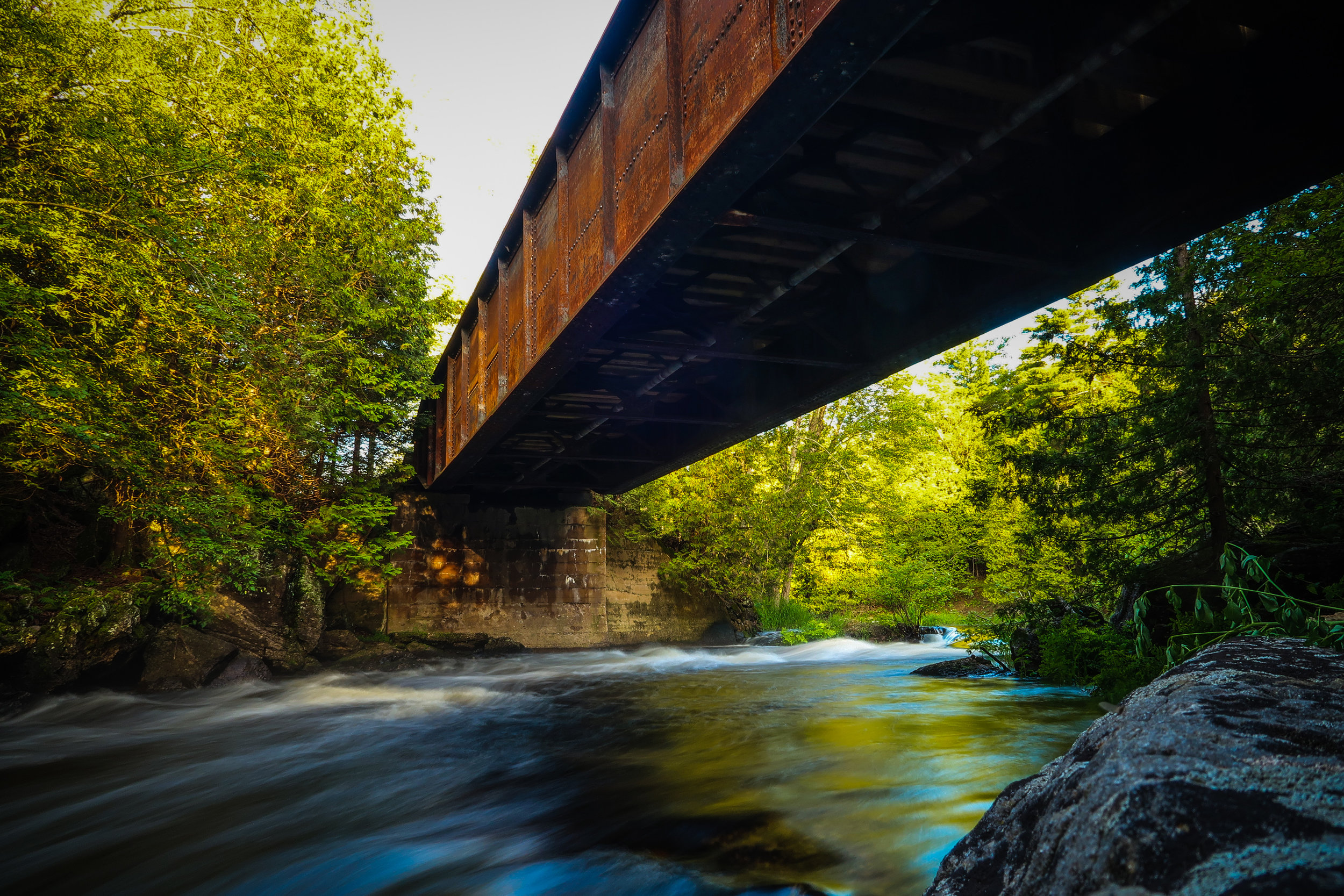  This old bridge along the Trans-Canada Trail crosses the Salmon River near Arden, Ontario. 