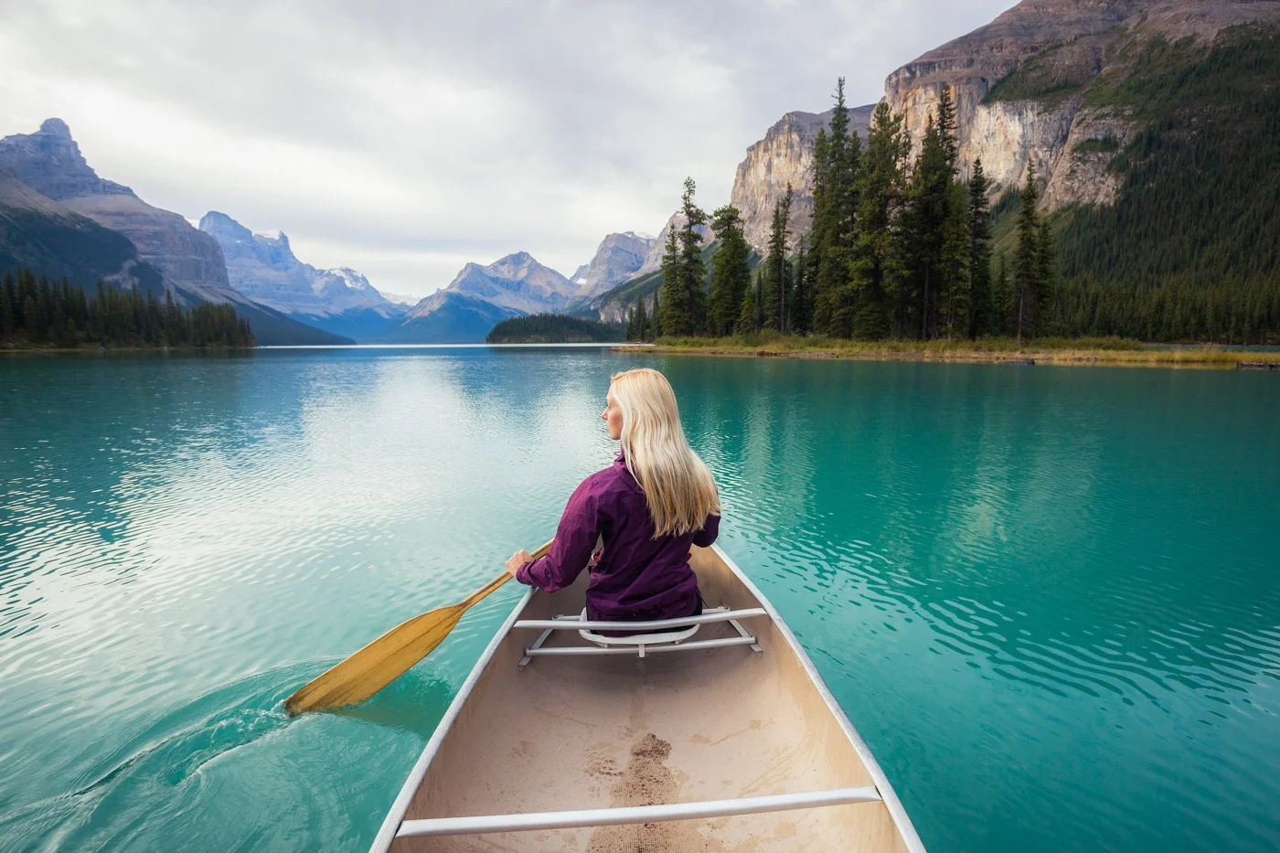 Maligne Lake in Jasper Christian in the Canoe by Michael Matti.jpg