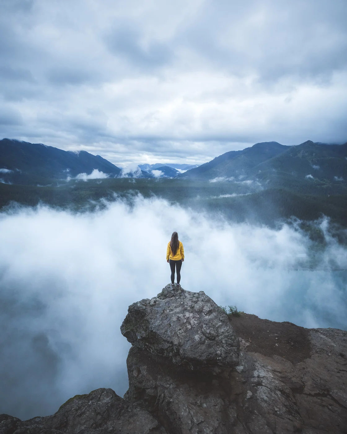 Rattlesnake Ledge with Andrea in teh clouds by Michael Matti.jpg
