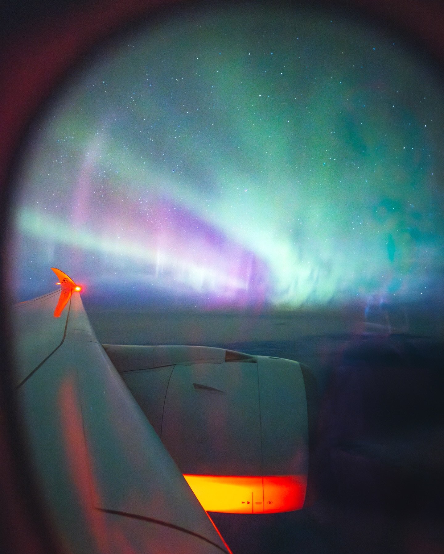 This is your reminder to look out the window if you&rsquo;re flying over the northern hemisphere at night, particularly if you have a north facing window on flights between the US and Europe. 
Shooting this is quite challenging, especially if you&rsq