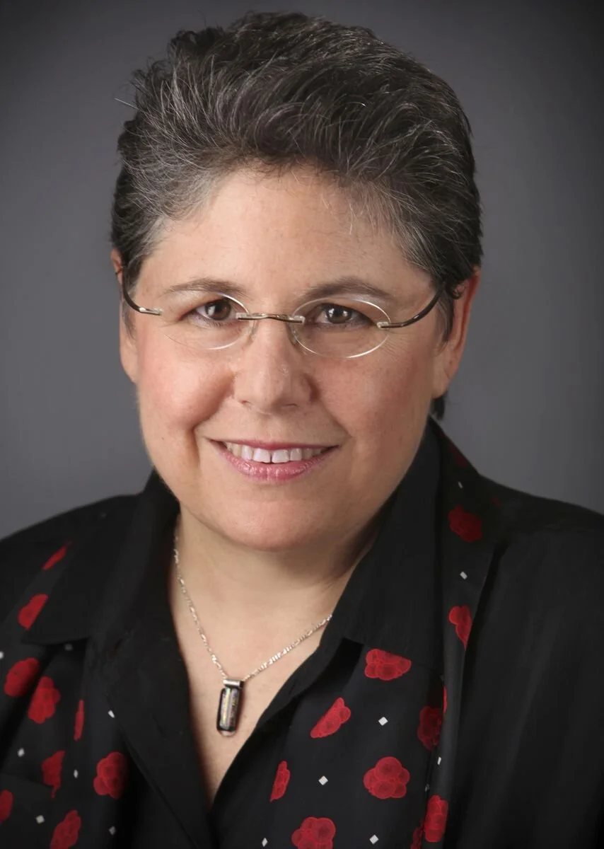 Mature-woman-smiling-531416118_6144x4080.jpeg
