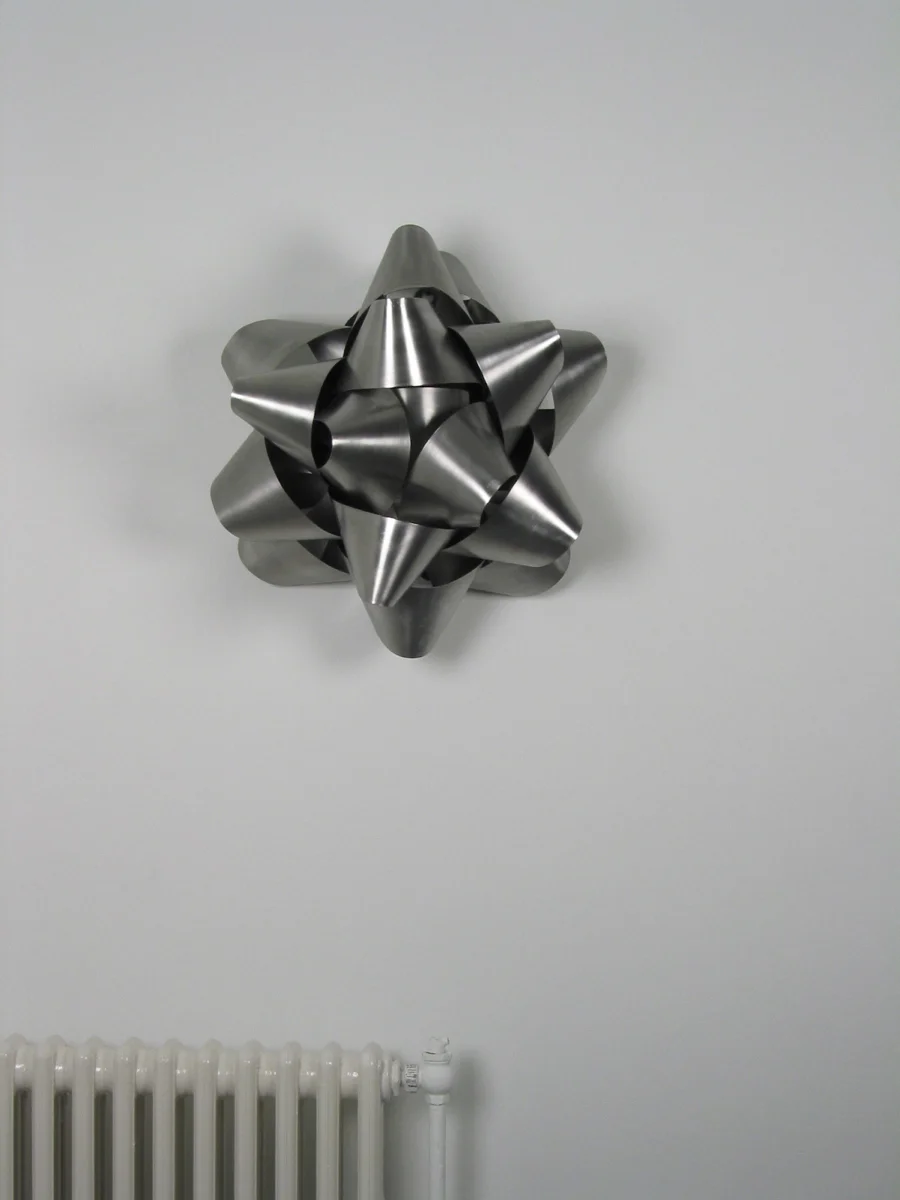 Steel Bow.  steel, 30" diameter