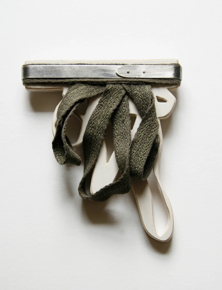Loops, brooch. silver, cotton, painted wood, 5”x4”