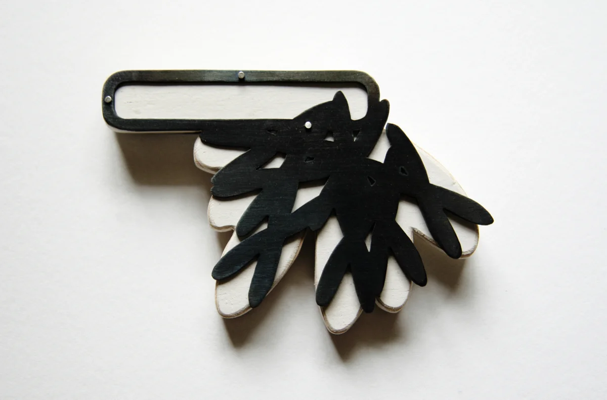 Squeezed Ovals, brooch. silver, steel, painted wood, 2”x3”