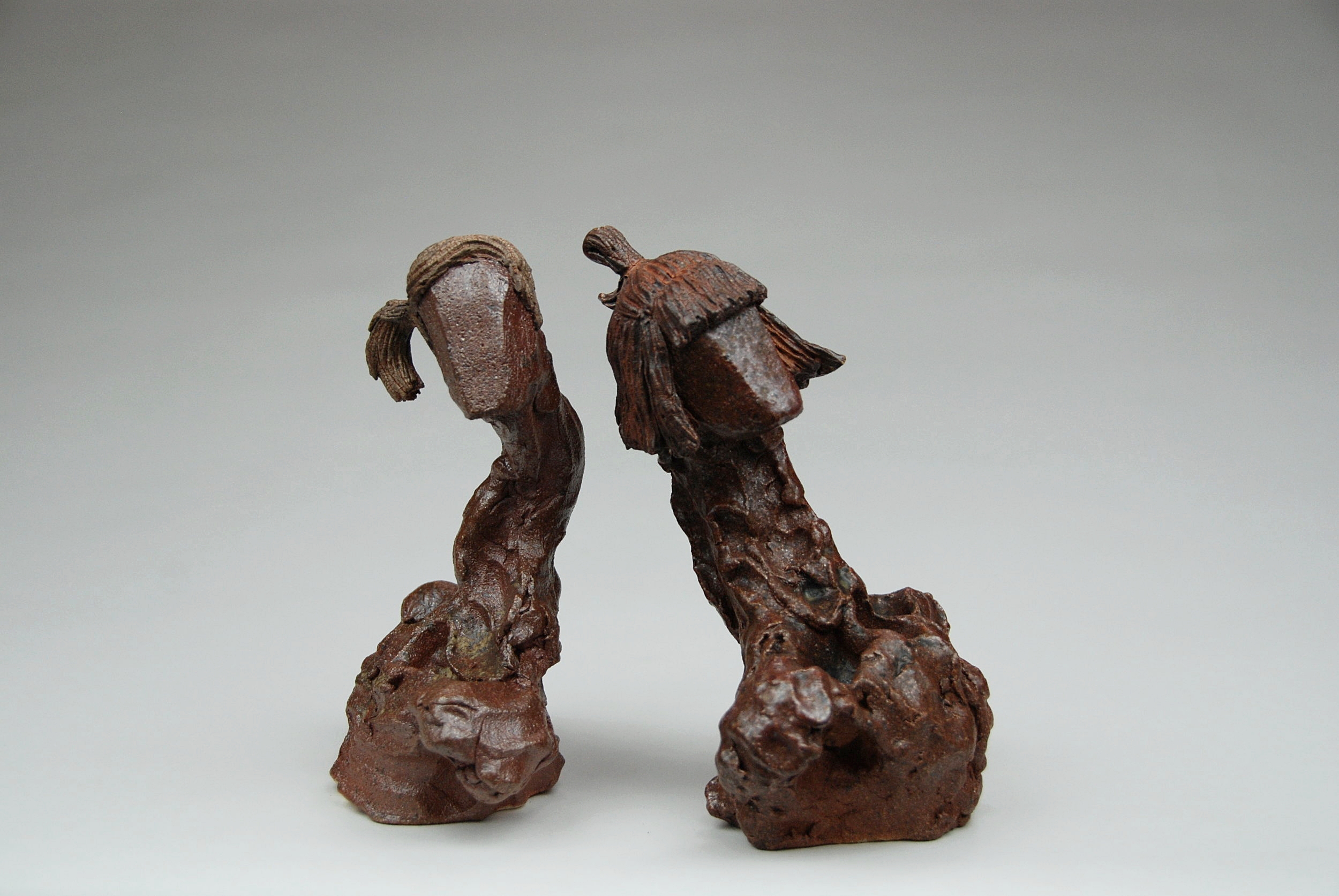  4.5” x 3” x 7”/5” x 3” x 7” Solid built figures, salt fire cone10 reduction cool, Summer 2017 