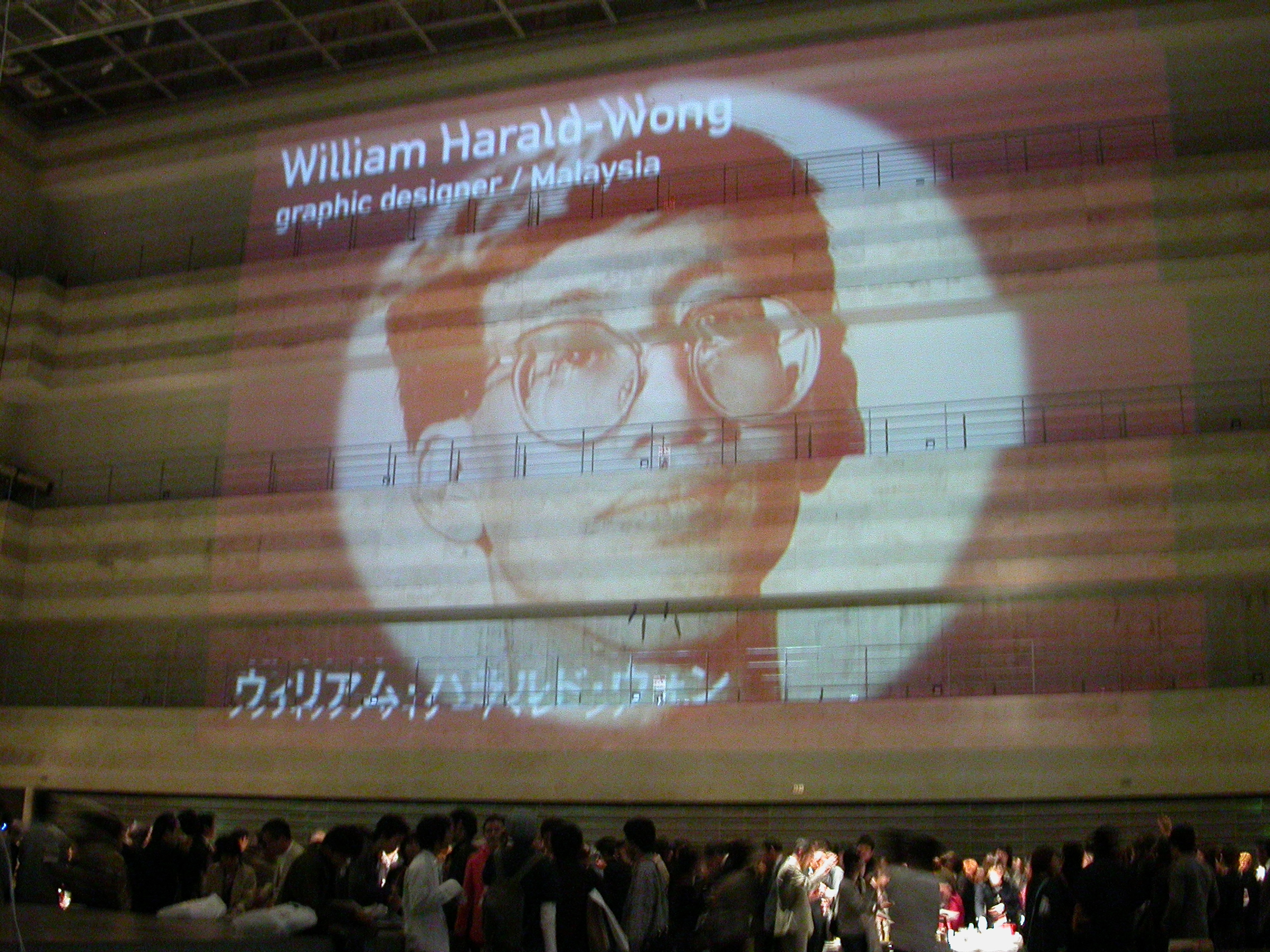Portraits of key presenters at Visualogue , Icograda International Design Congress 2003, were projected on the interior wall of the Nagoya Congress Centre, Japan. William led The Design Alliance Asia to a three-and-a-half-hour presentation, AsiaBeat—A Clash of Signs and Symbols, covering visual ideas from ten Asian countries.