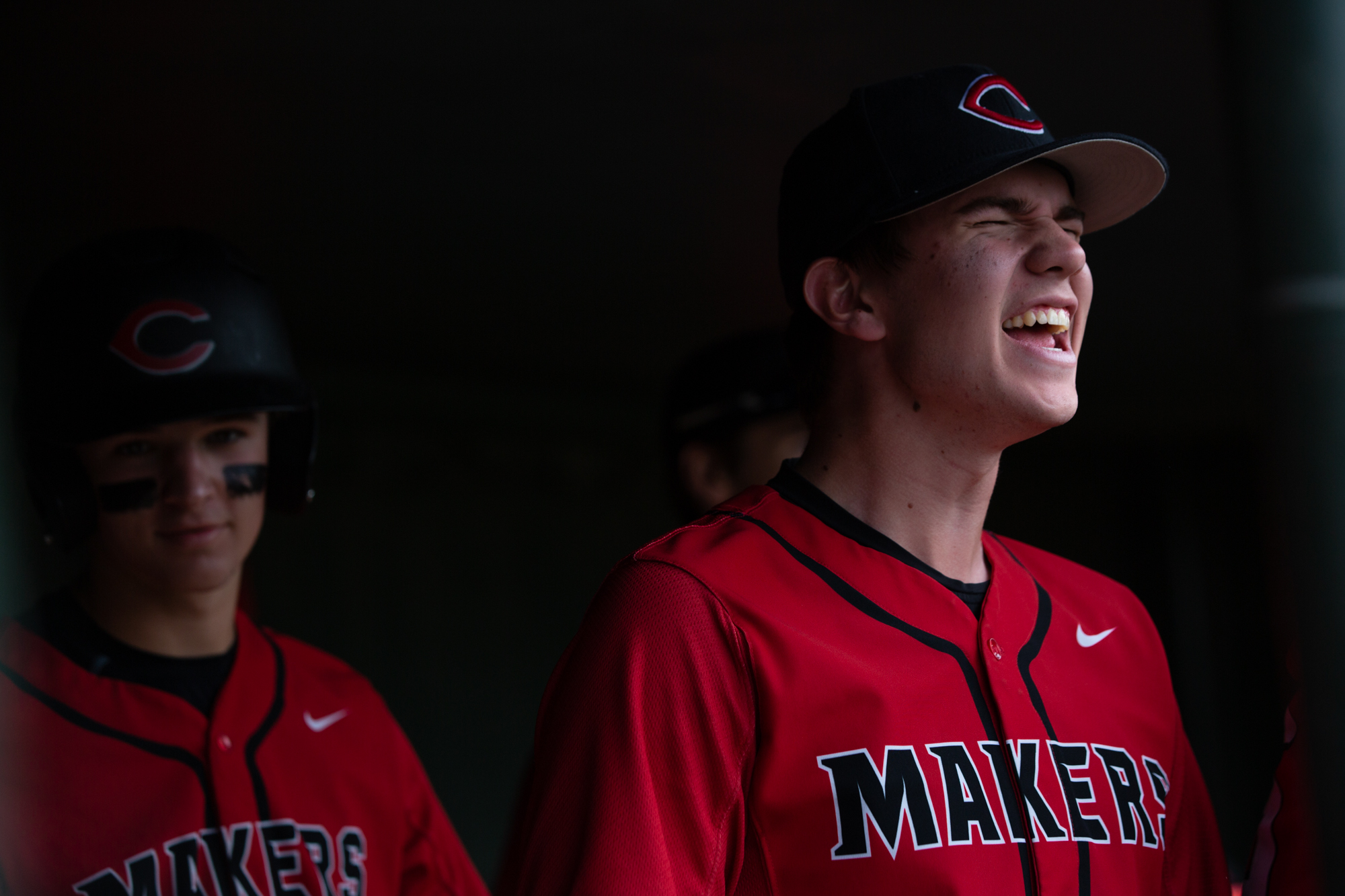 Luke Brewer of the Camas Papermakers cheers on his teammates from the dugout during a game against the Issaquah Eagles at Propstra Stadium on Saturday afternoon, May 18, 2019.