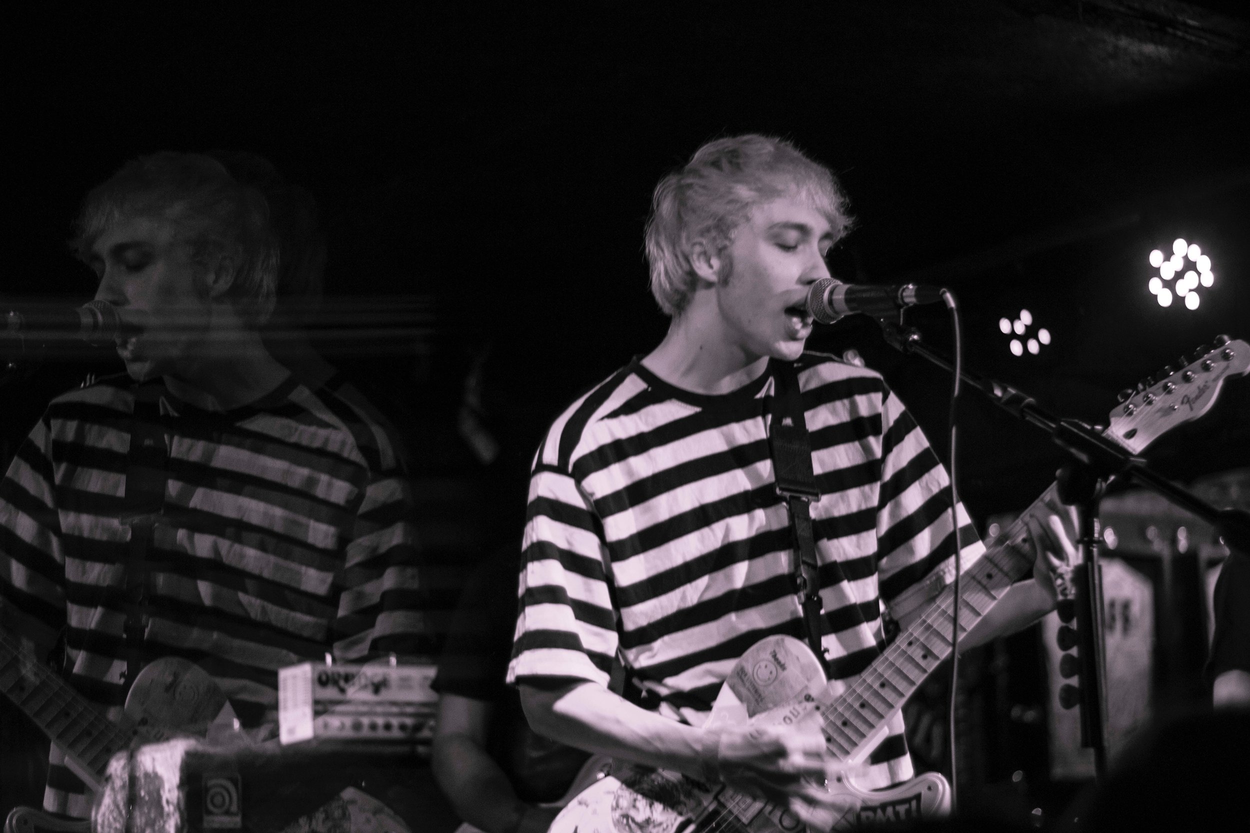 Tate Logan - A Band Called Happy.jpeg