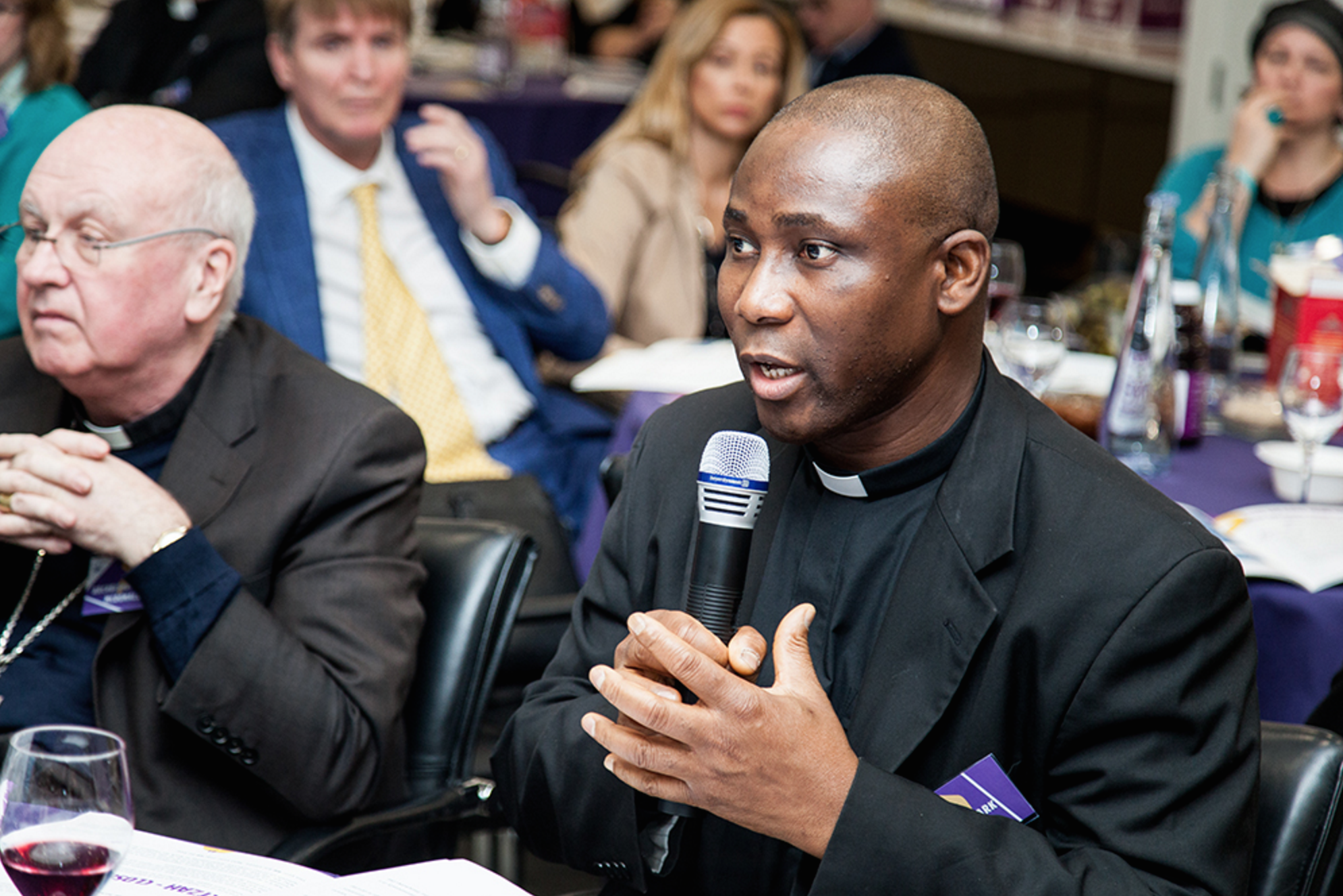Father Mark Odion of The Catholic Church talking about human trafficking in his home country, Nigeria
