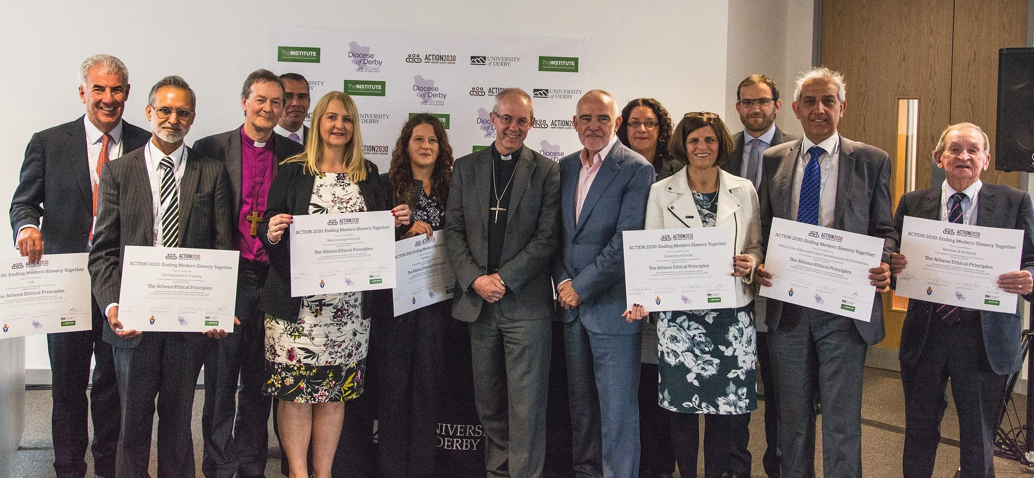 Business Leaders hold their co-signed declarations at Action 2030