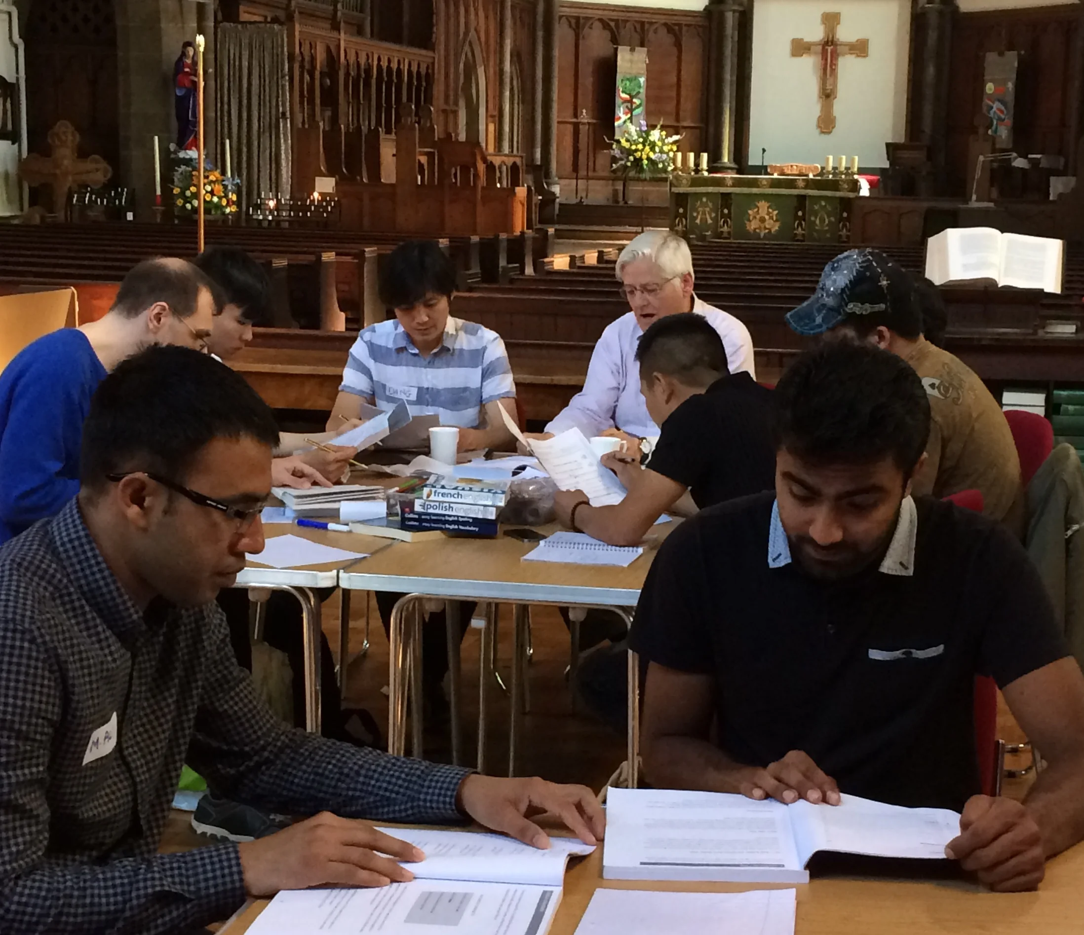 There are men of many different nationalities at the class, who all speak different languages. 