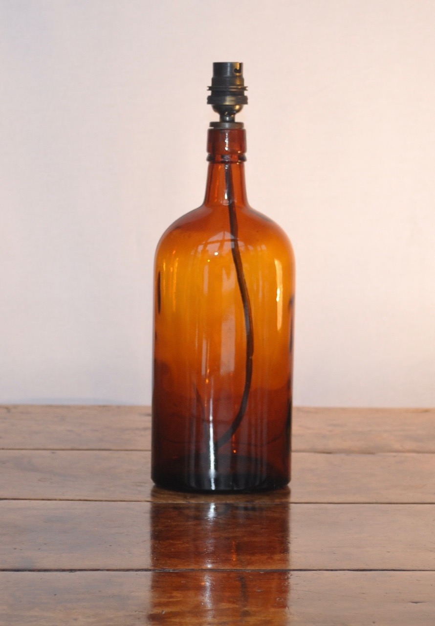 Antique Amber Bottle Lamp.jpeg