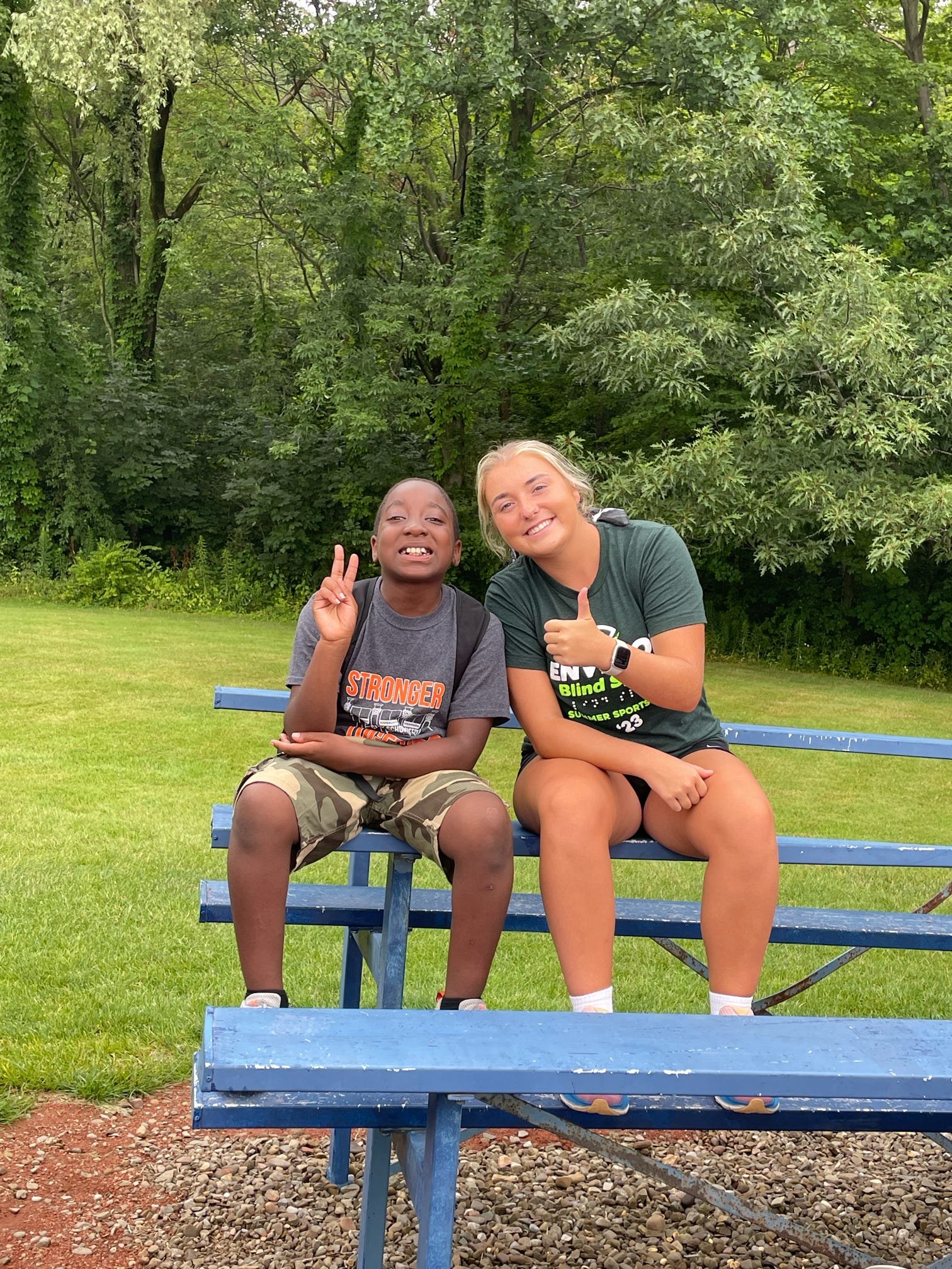  Darryn and Nikki sitting on the bench taking a break during camp 