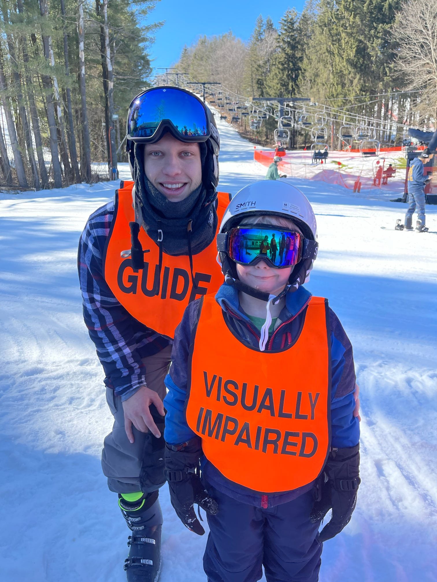  Tyler instructing one of our visually impaired skiiers 