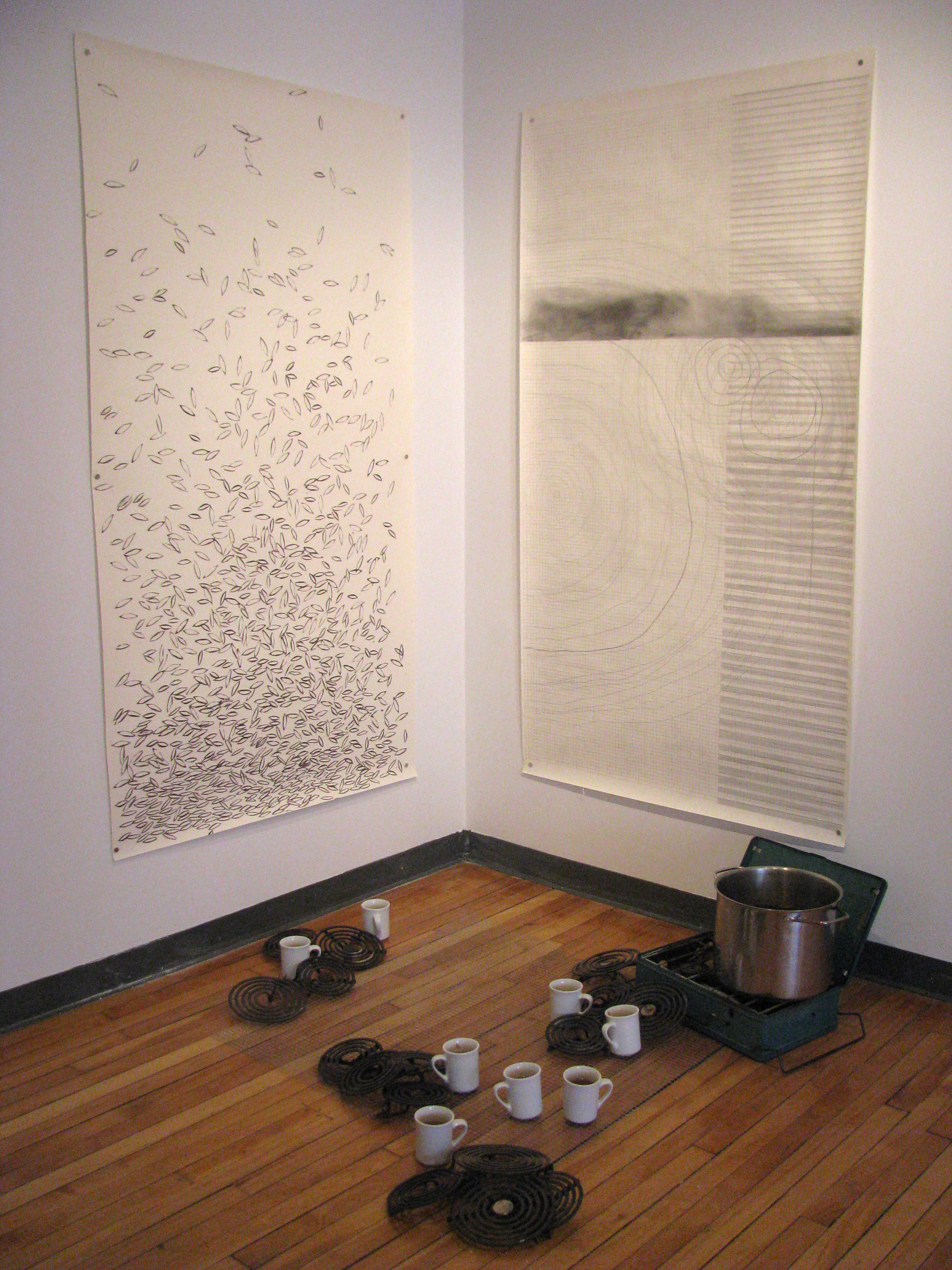 Suzanne Morrissette, solve, for some (installation shot), 2011, installation with ink and pencil on paper, cookstove, wire mesh, ceramic cups, labrador tea, stovetop elements.Photo by Lisa Myers.