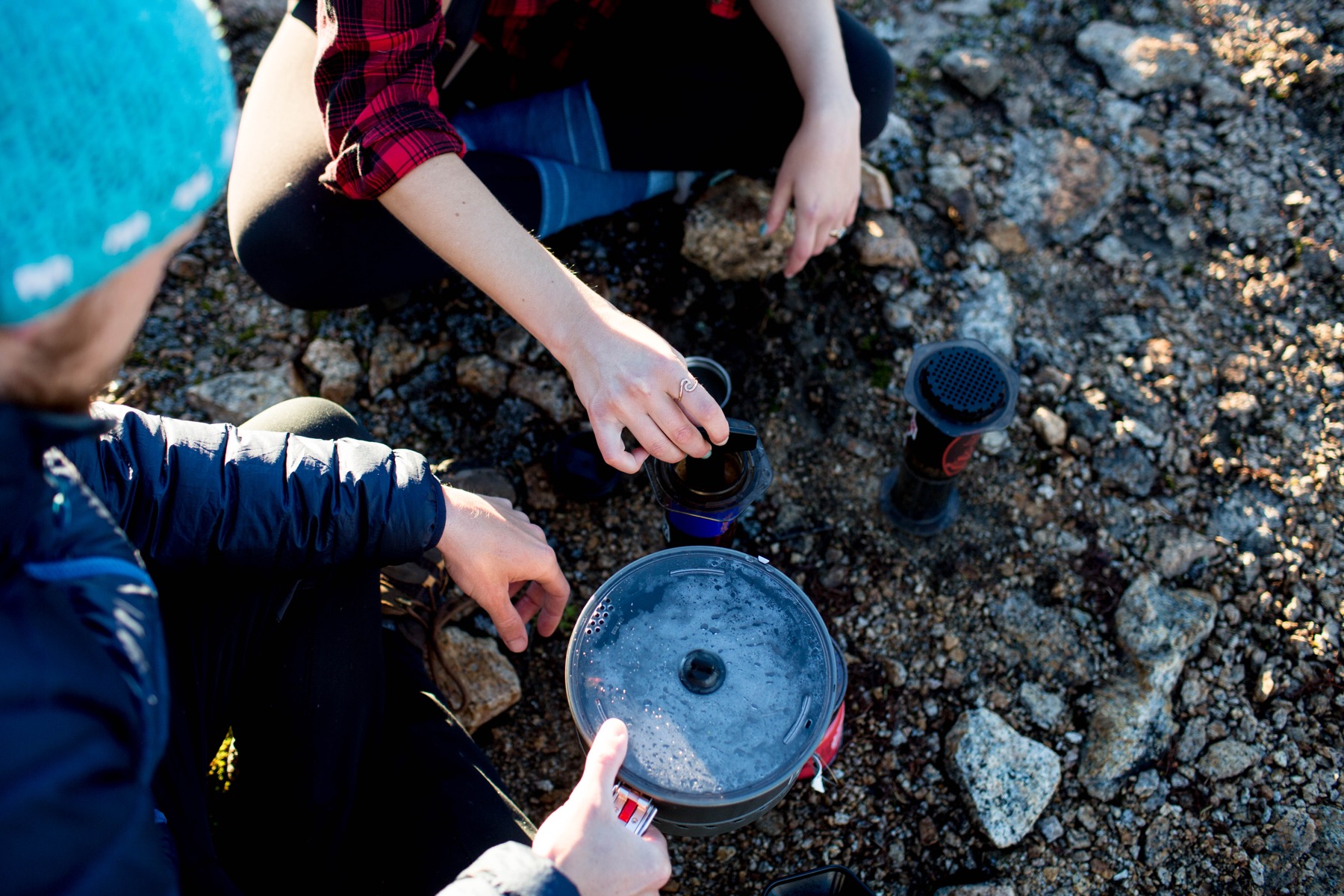Travel Coffee Kit essentials include an aeropress, fresh coffee beans and an MSRP Reactor stove to boil water. Photo by Brooke Fitts