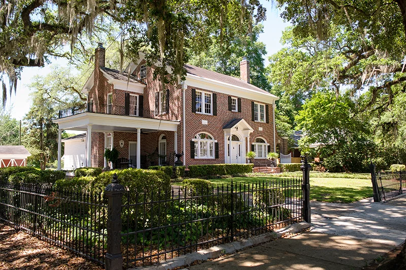 reynolds A true Bainbridge architectural treasure was originally built in 1923, by Dr. Robert E. Wheat and purchased by Mr. and Mrs. Rueben Reynolds, Jr. in 1970. The elegant and timeless two-story structure presently remains in the Reynolds family, and extensive restorations were made in 2014 - 2015. The current residents and cousin of the Reynolds sons, Mr. and Mrs. Maston Griffin, are devoted to maintaining the historical grace of the home and the gorgeous rose gardens located on the property.