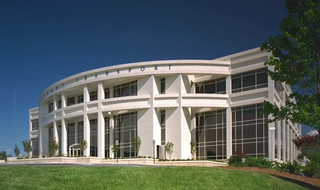 Covenant Transportation After developing a master plan for Covenant Transportation this project was completed in two phases. Phase One comprised a 90,000 sf corporate headquarters buidling, 35,000 sf truck service buidling, a truck wash, and development of the 175 acre site for 730 cars, 158 trailers, an 70 tractors. Phase Two included a 100,000 sf expansion of the office space.