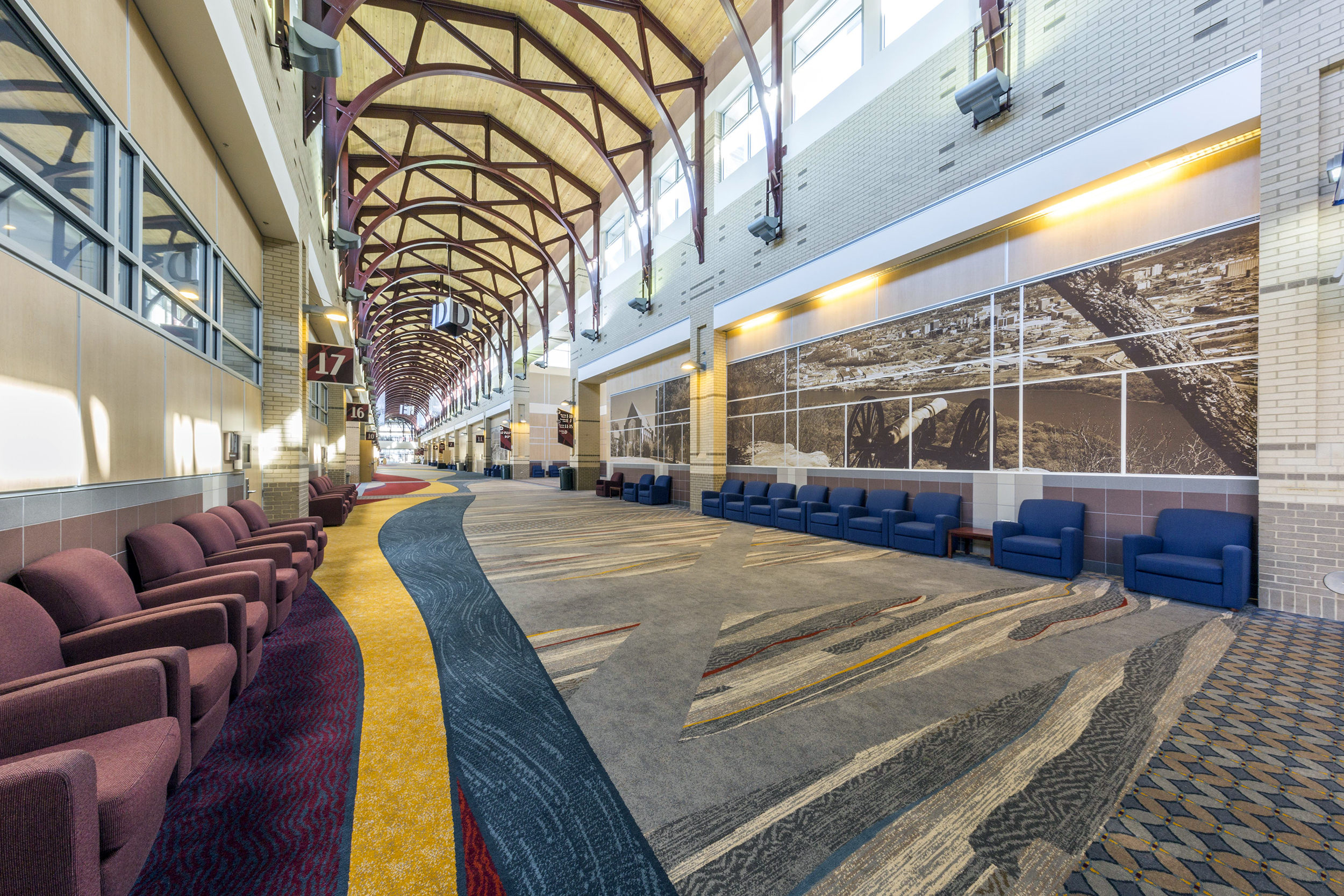 Chattanooga Convention Center This 300,000 sf facility holds 21 meeting rooms and 19,000 sf of divisible ballroom space along its 900' length. The 100,000 sf, column free Exhibit Hall features the first daylite convention hall in this country. A pedestrian arcade framed with brick columns and arches gives this two city block long structure a human scale.