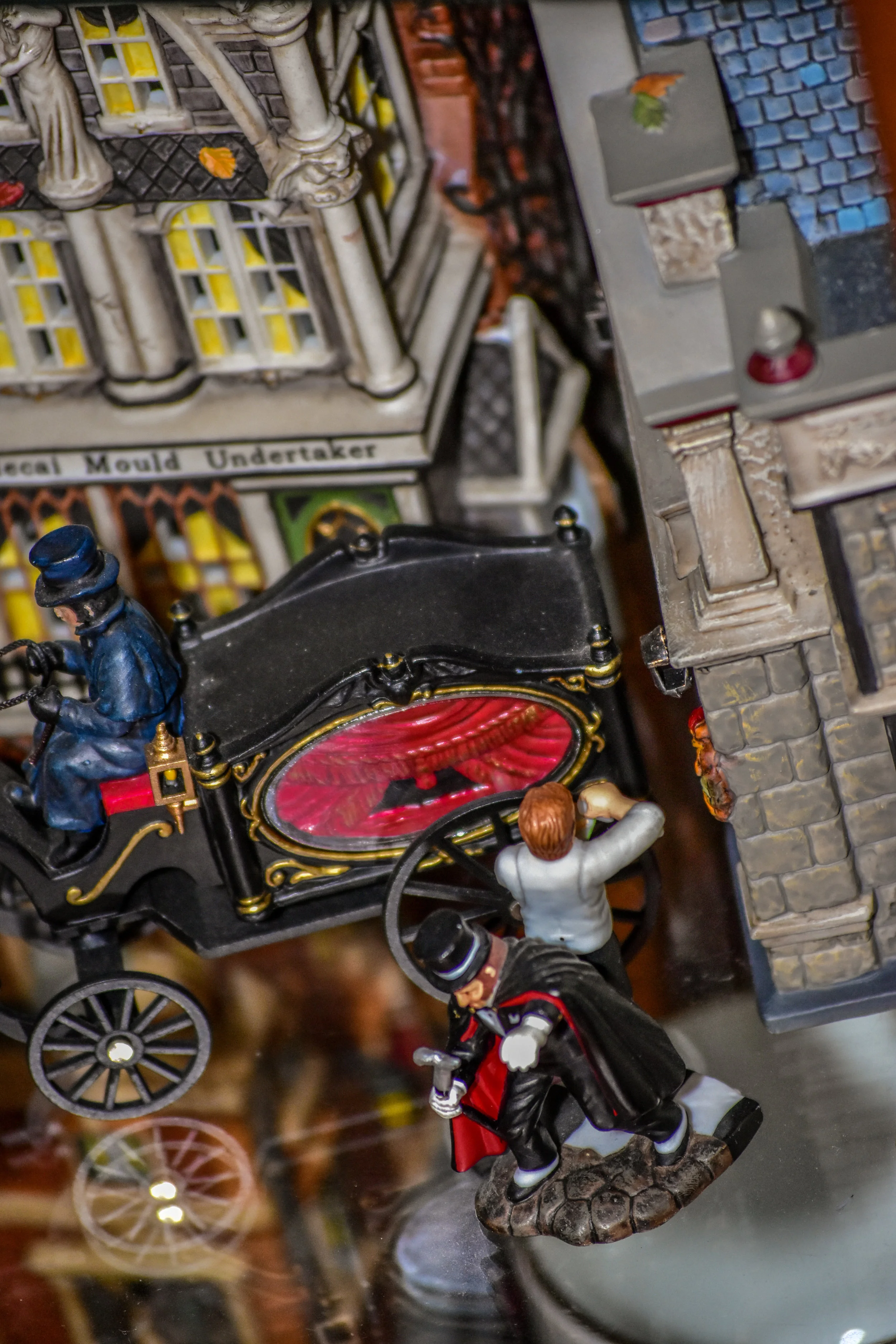 This is the 'Mordecai Mould Undertaker' piece from the Dickens Village Collection.