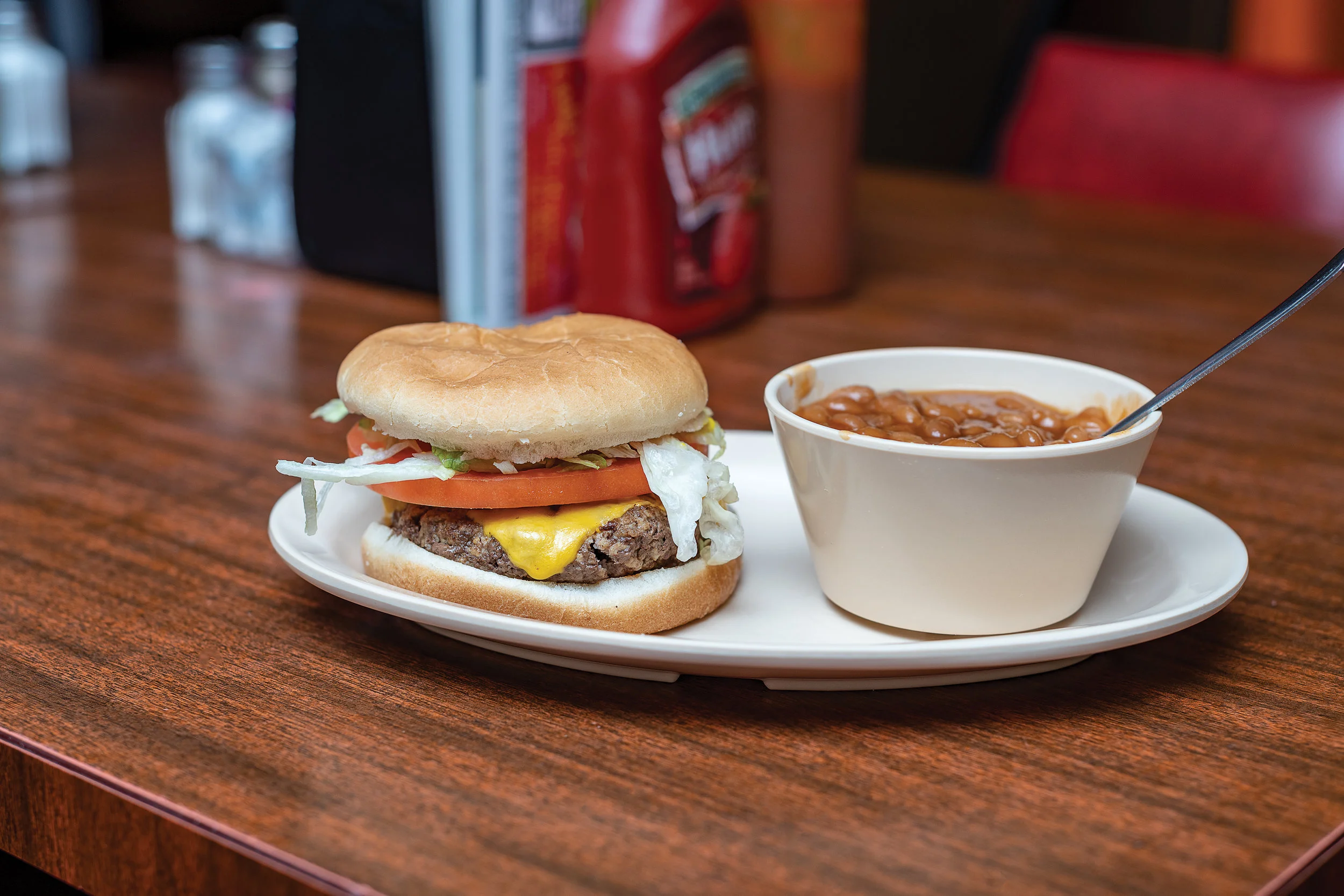 Single cheeseburger with baked beans