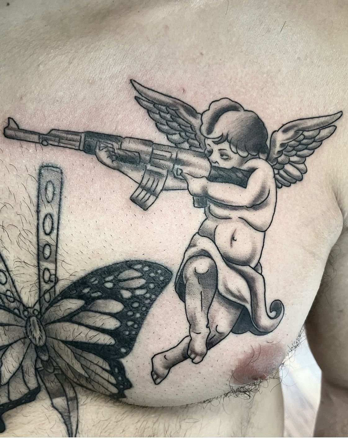Four little angels   Martin Švec  Hand  Gun tattoo  Facebook